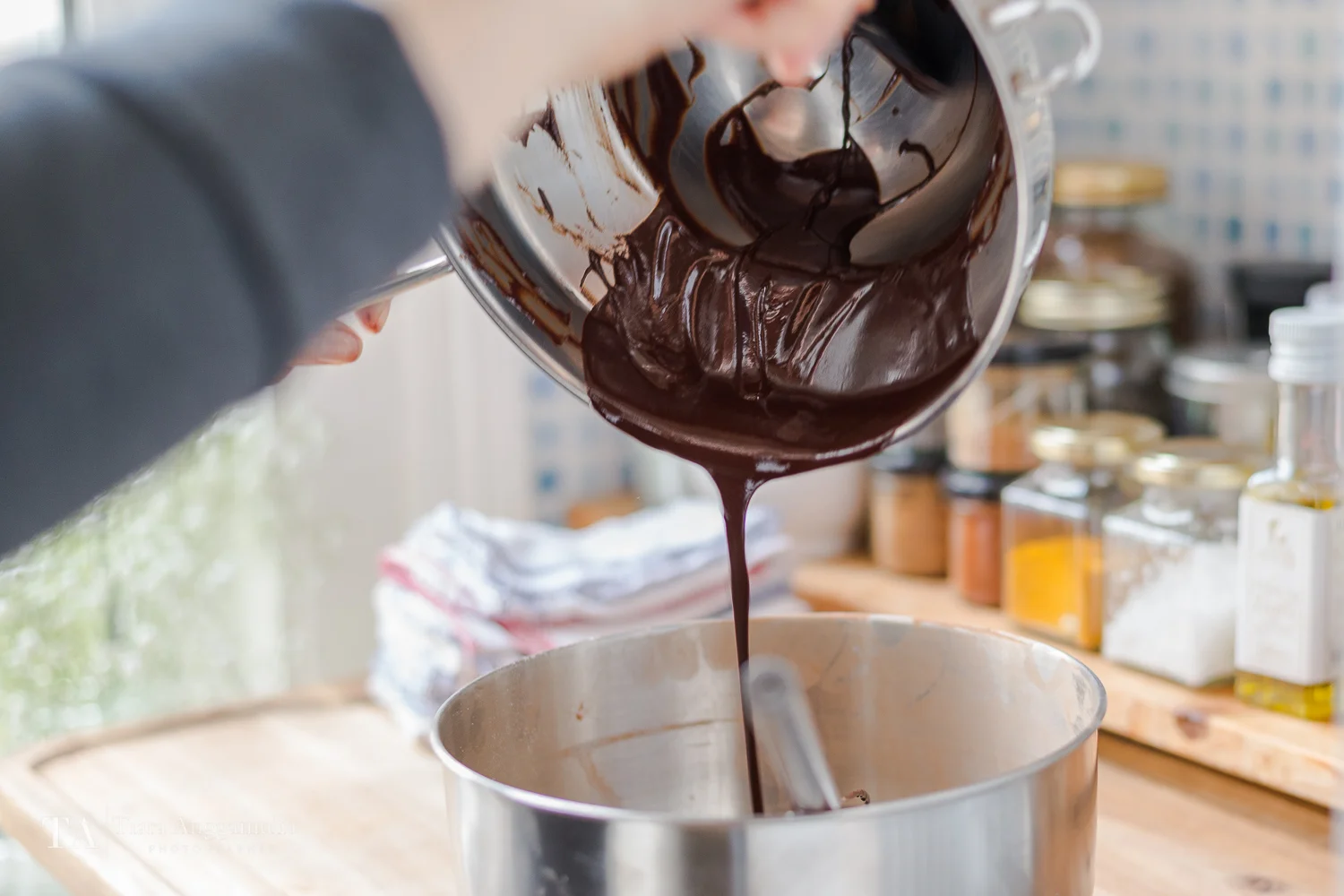 Pouring melted chocolate.