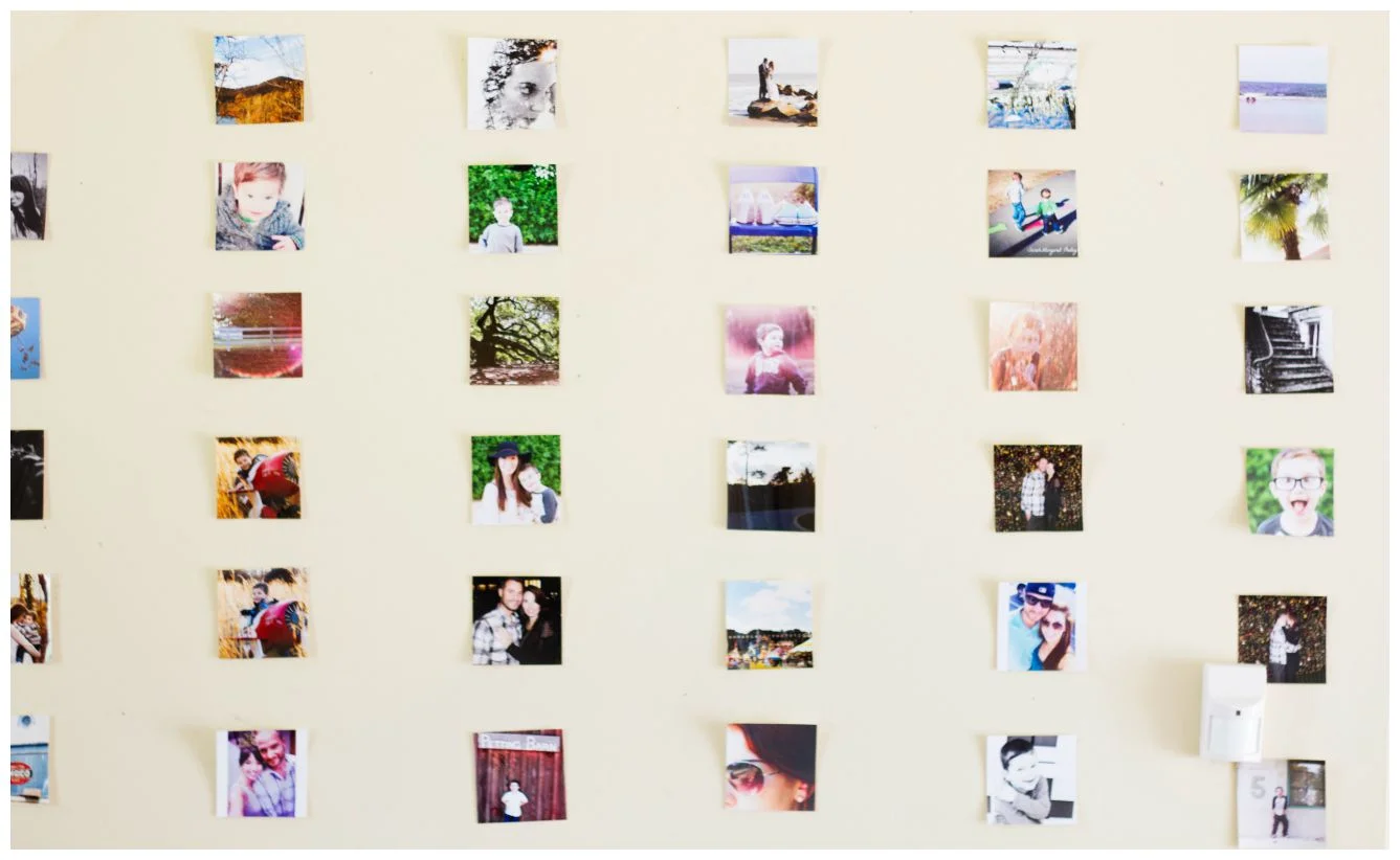 If you don't want to spend the money to take film photographs, just print your digital files. Hang them up in your home! People want to see your life when they come into your house! It tells a story, its a gallery of YOUR life. It will make you happy too, I promise! :) 