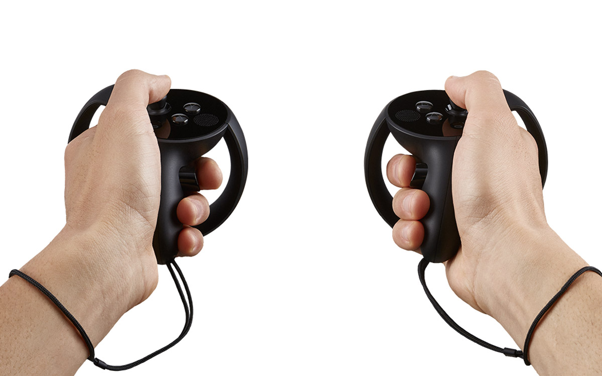 I tried the Oculus Touch controllers. They aren't released yet, but they're looking and feeling pretty darned cool.