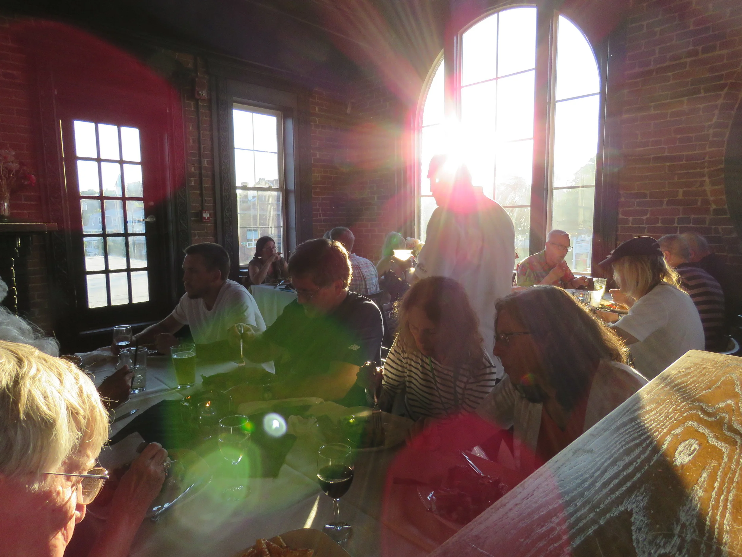 The sun sets over the poets