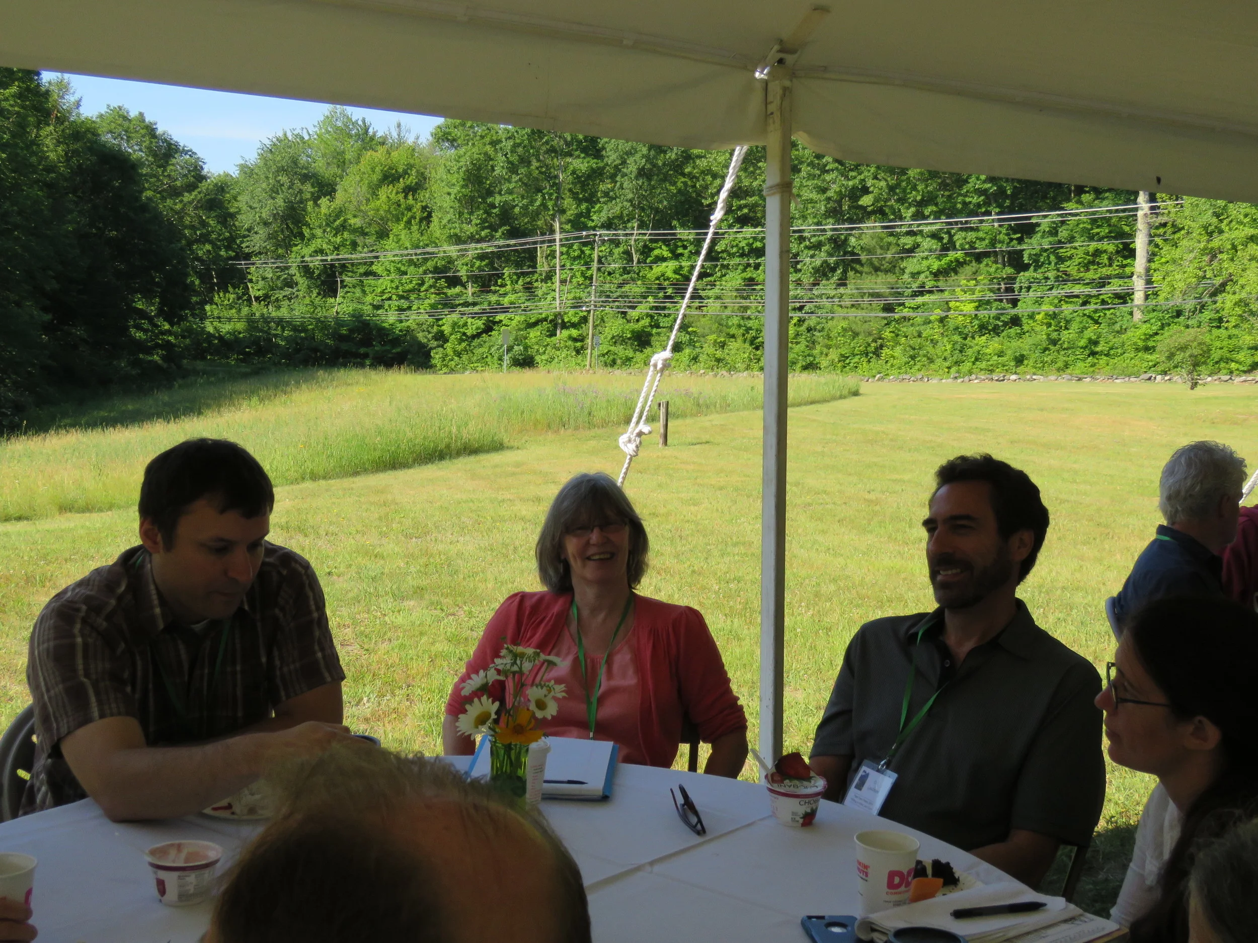 Students hold an impromtu round table discussion after breakfast
