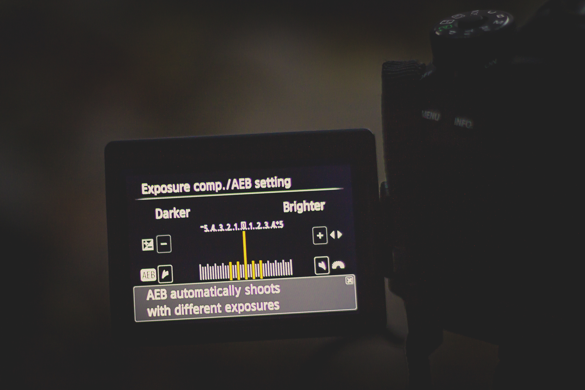 Auto-Exposure Bracketing: This setting tells your camera to take multiple photos in rapid succession with varying exposures at specified intervals. 