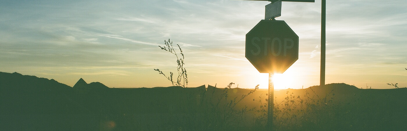 Extremely muted tones in the shadow when shooting a stop sign, back-lit by the setting sun. | Bronica ETRSi | Fuji PN 160NS