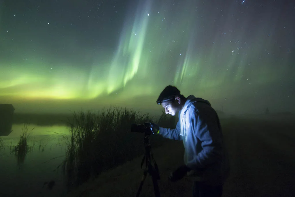 Herry adjusts his settings to compensate for the changes in exposure during a solar storm. | Canon 70D 11mm f/2.8 ISO2000 10s