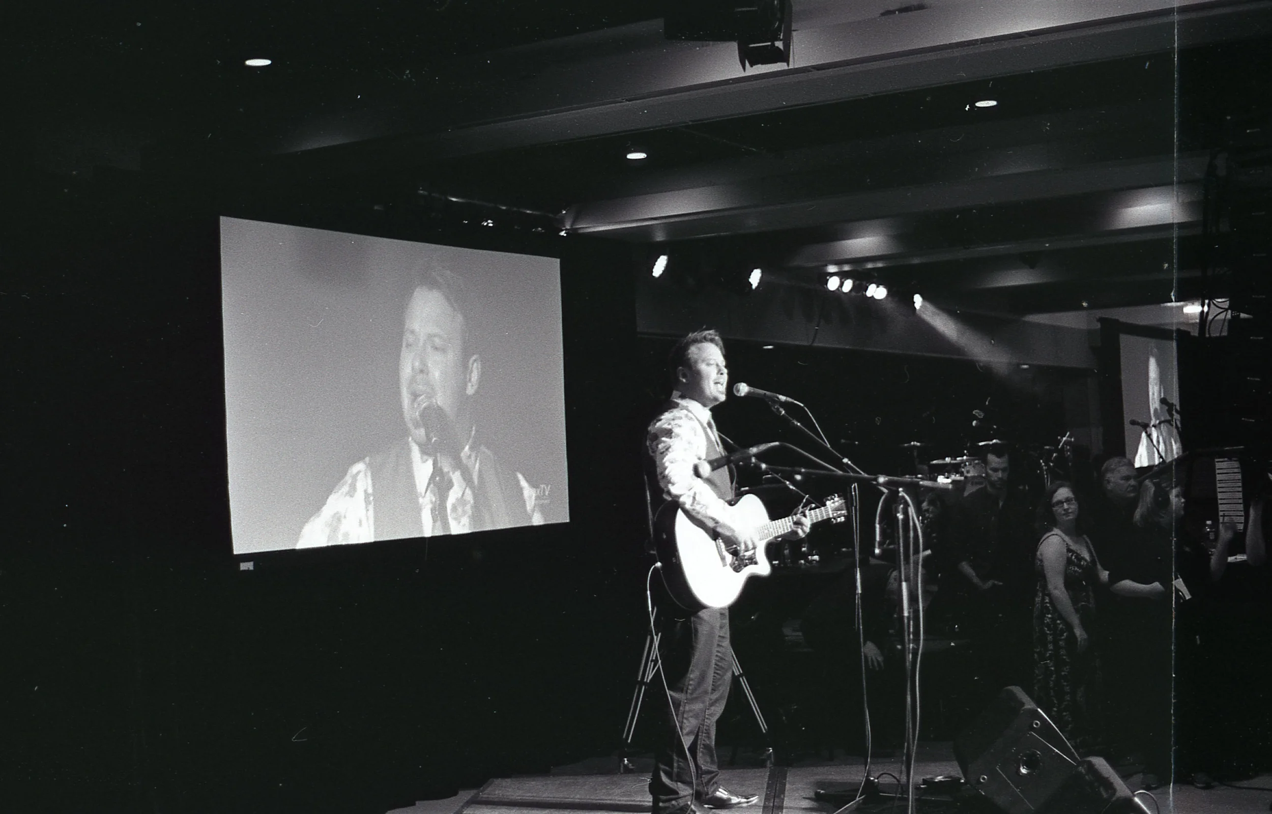 Alex Runions on-stage performing a song and taking home two SCMA awards. | Pentax K1000 / Kodak Tri-X @ 1600