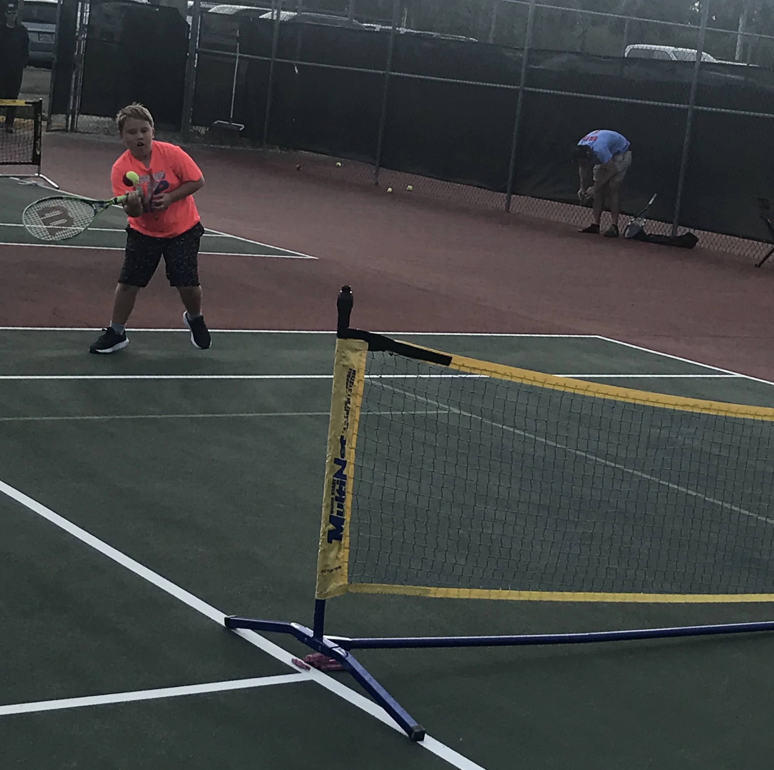 Davison moving out wide for his forehand return vs. Ryan.
