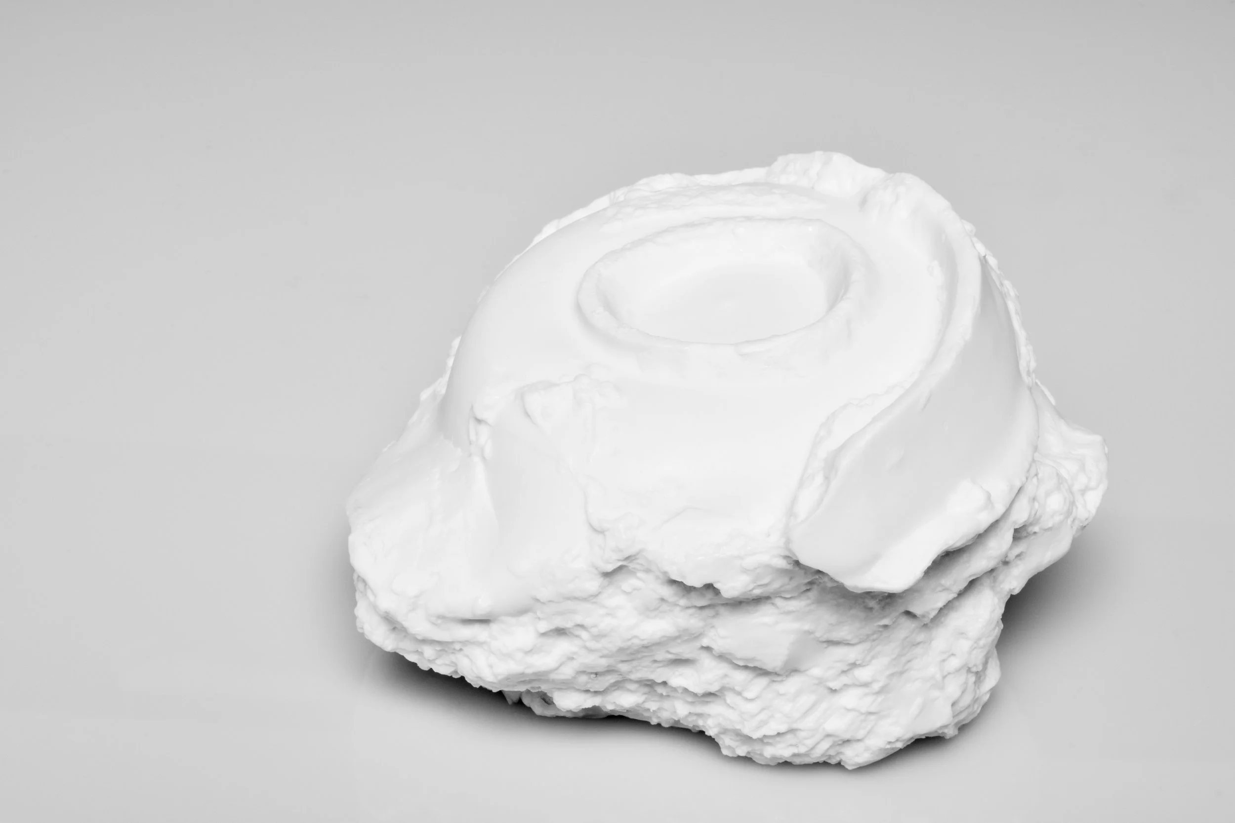 Saggar | Form Series , Jindezhen Porcelain with Glaze. 2017 - on going Ming Dynasty collapsed saggar and porcelain forms were collected from various sites around Jingdezhen, China, and moved through the mold making process; cast as thin porcelain versions of their former selves. Shifting form to surface, these objects touch lightly towards ideas related to dislocation, longing, and the inescapable potential of the cast off. Collapsing time and place, their glazed interiors seek to reanimate the objects as functional vessels of the present.