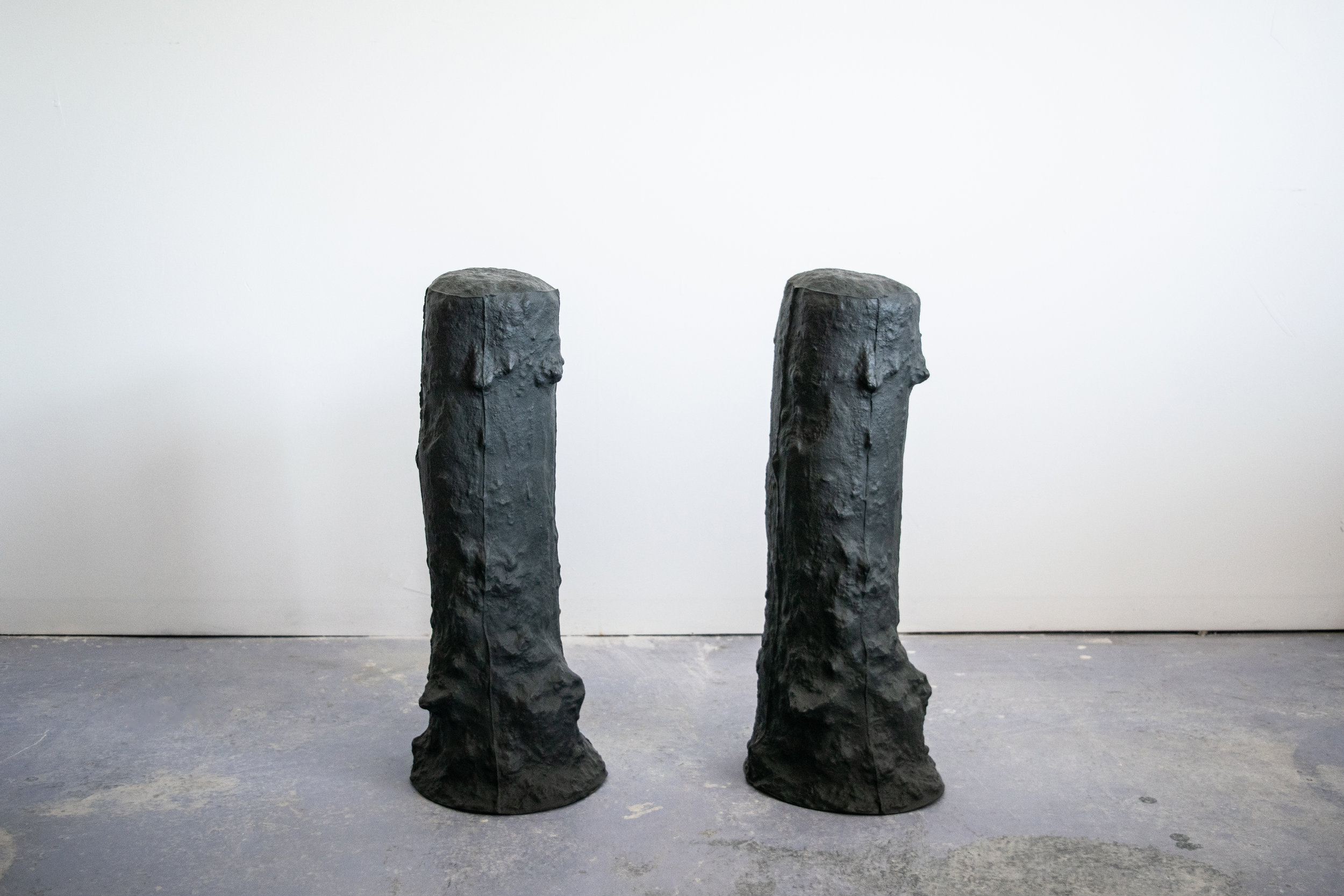 terrain and territory , slip cast black porcelain with glazed interior 10” diameter x 28” tall. 2018 terrain and territory focuses on the potent space of the fence post hole as a metaphor, and commentary against the current administrations deter