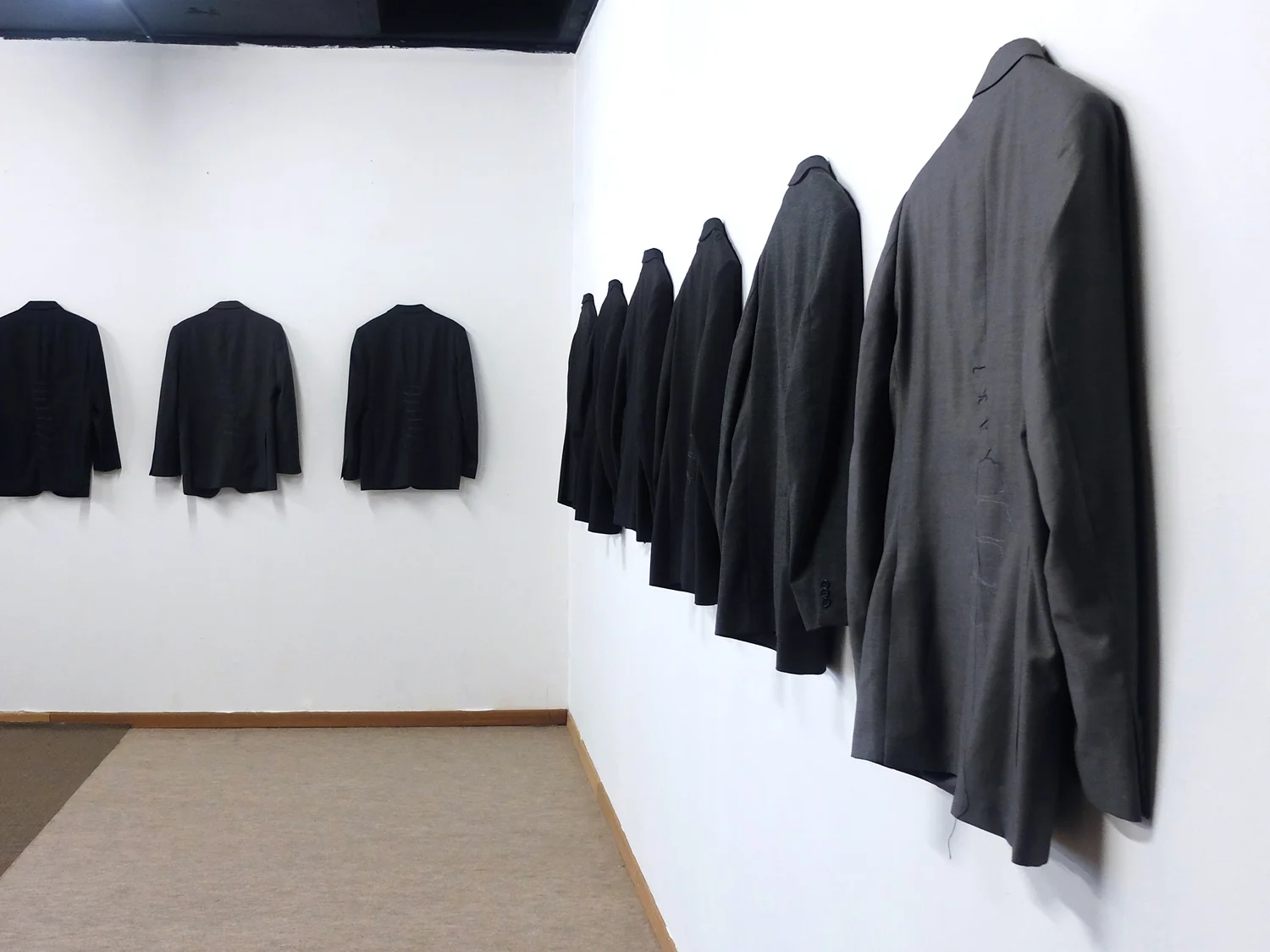 (Infinity) In a grain of sand , embroidery on recycled jackets, (10x) 25 x 31 inches (65 x 80 cm)