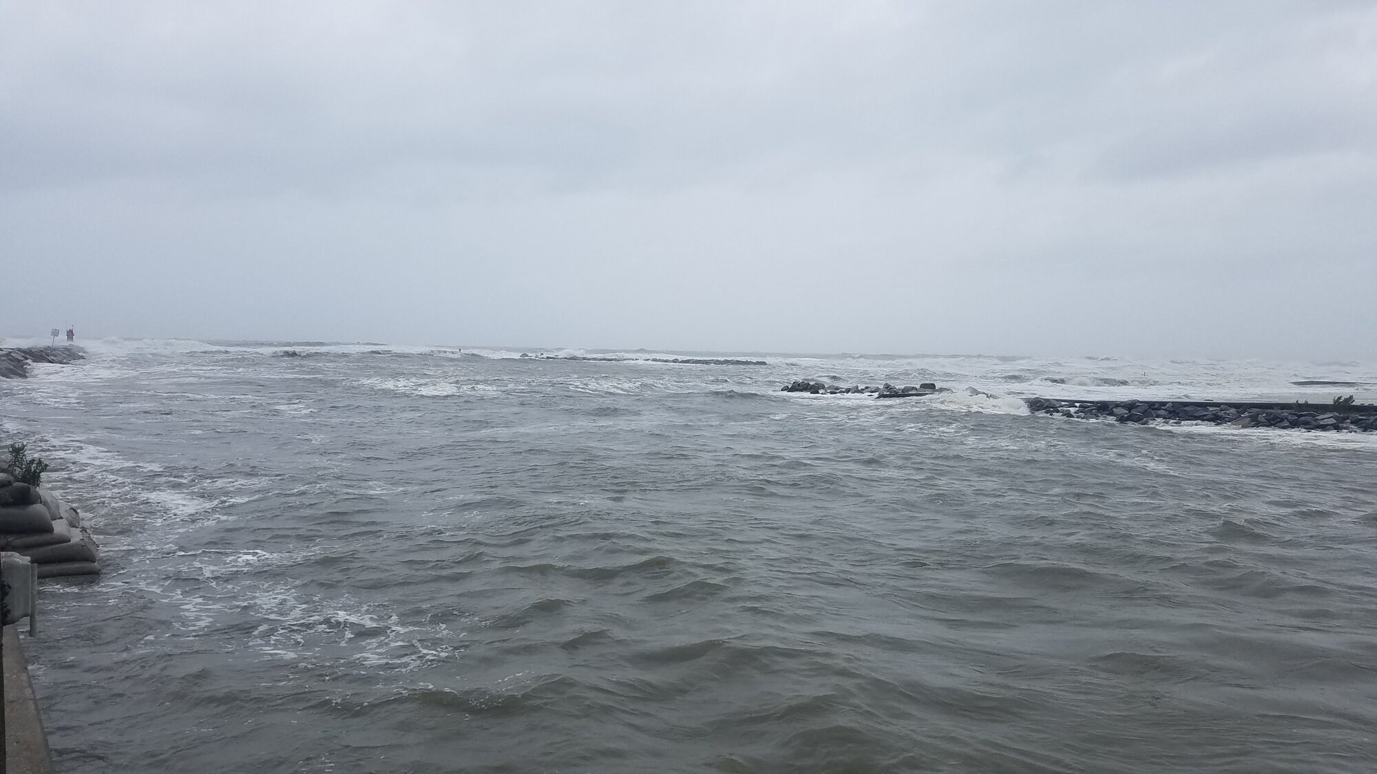  Rudee Inlet on 6 Sep, during the height of Hurricane Dorian’s passage, with the offshore jetty barely visible at high tide. 