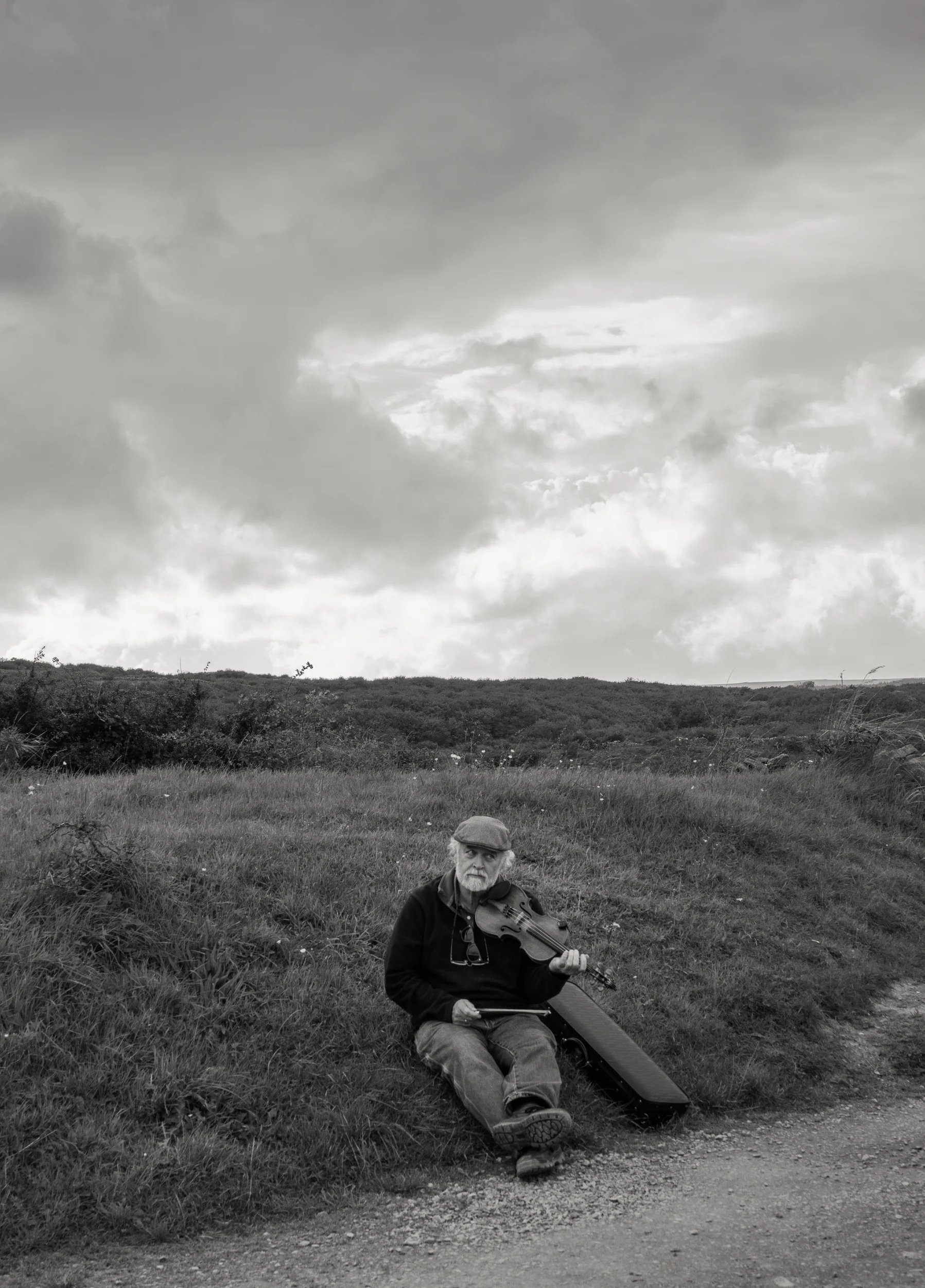 Fiddler at Poulnabrone, County Clare Ireland