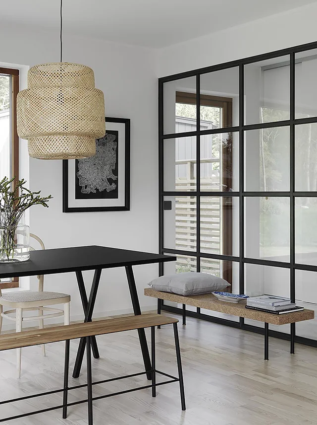 Black-steel-framed-indoor-windows.-IKEA-Sinnerlig-pendant-and-coffee-table.jpg