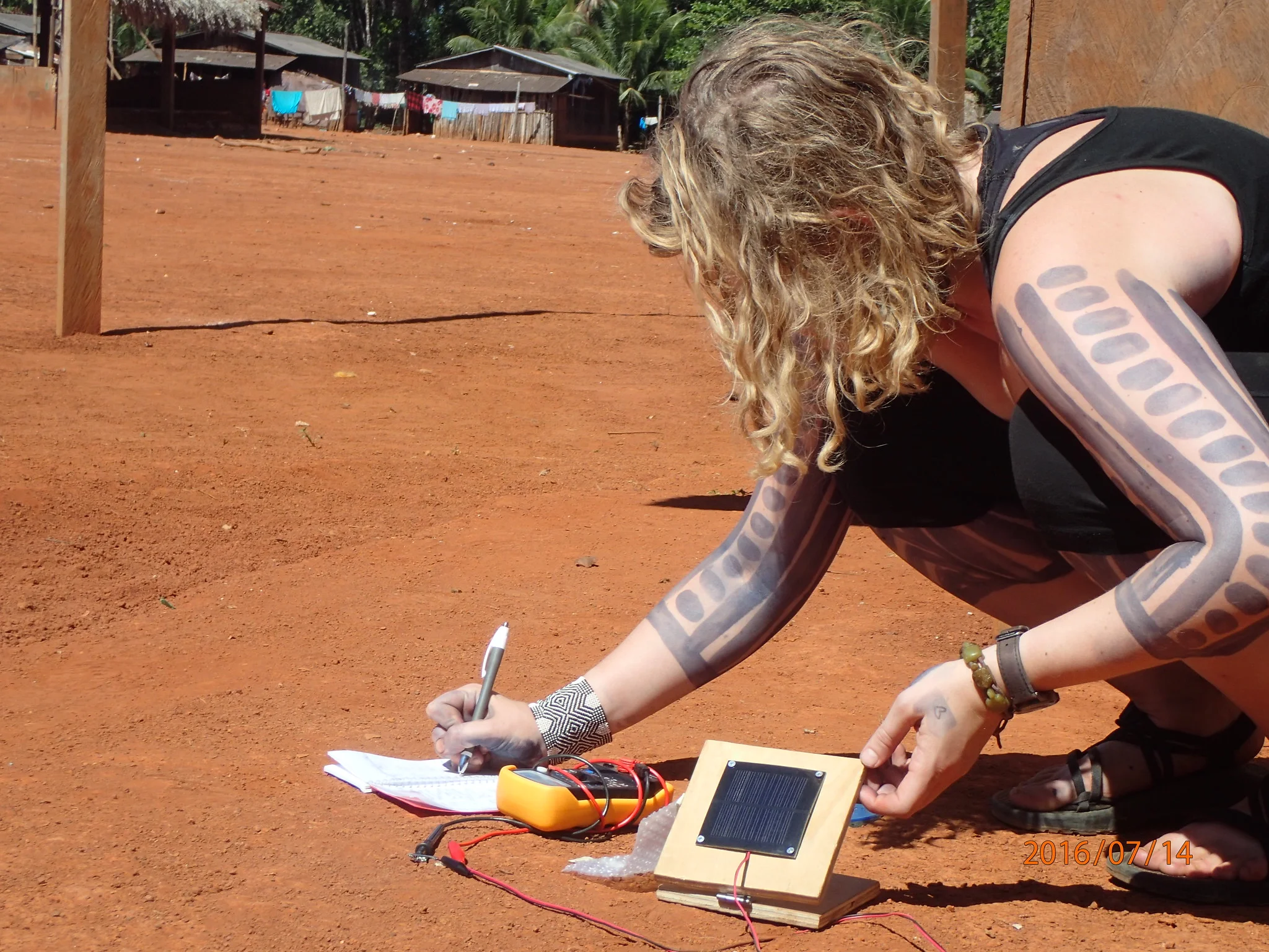 EEE and ANTH undergraduate student Kaitlin Harris taking solar measurements to design sustainable power solutions for Kokojagoti, a Kayapó media collective.