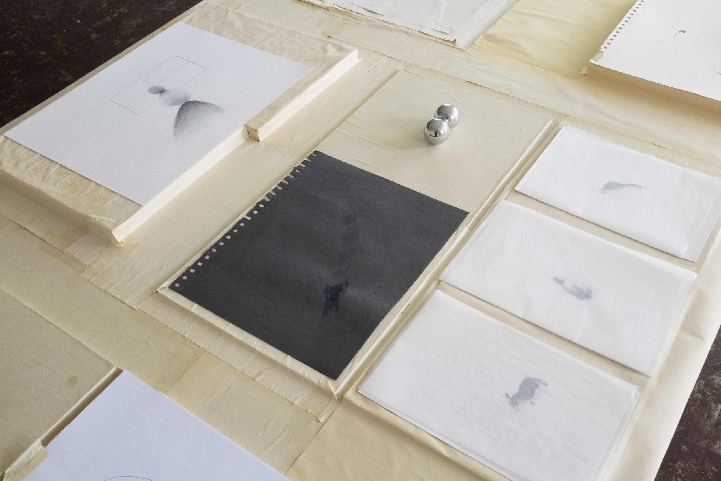 Table, oxidized packing paper, glue, foam, found objects, charcoal, graphite, wax paper, tape. Studio courtesy Summer Studio Grant from the Anderson Gallery in Richmond, VA.