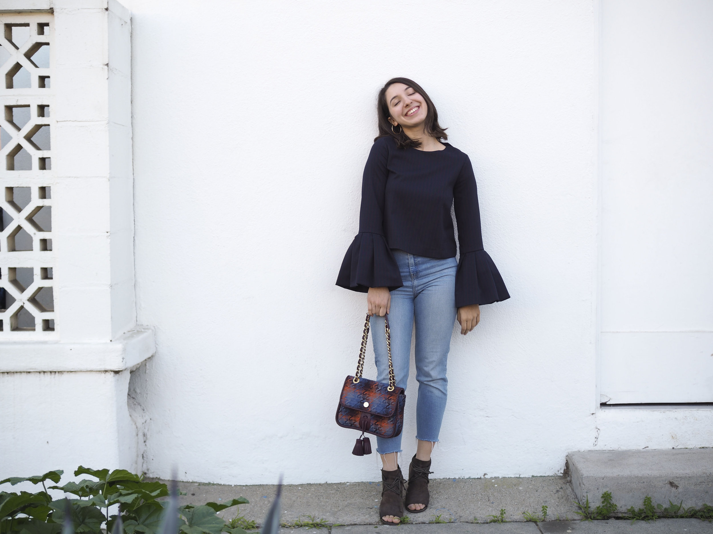 Zara Top, Top Shop Jeans, Vivienne Westwood Purse, Marsèll Shoes and Unknown Earrings. 