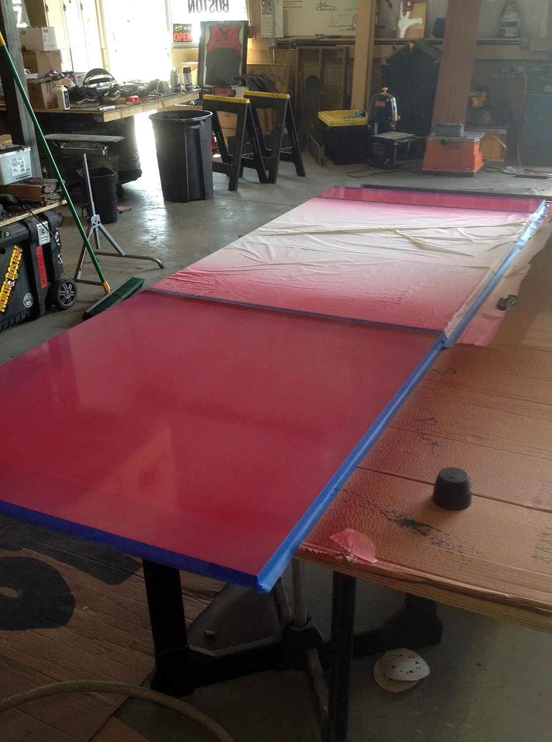 Spray finishing the final color on the table underside. 