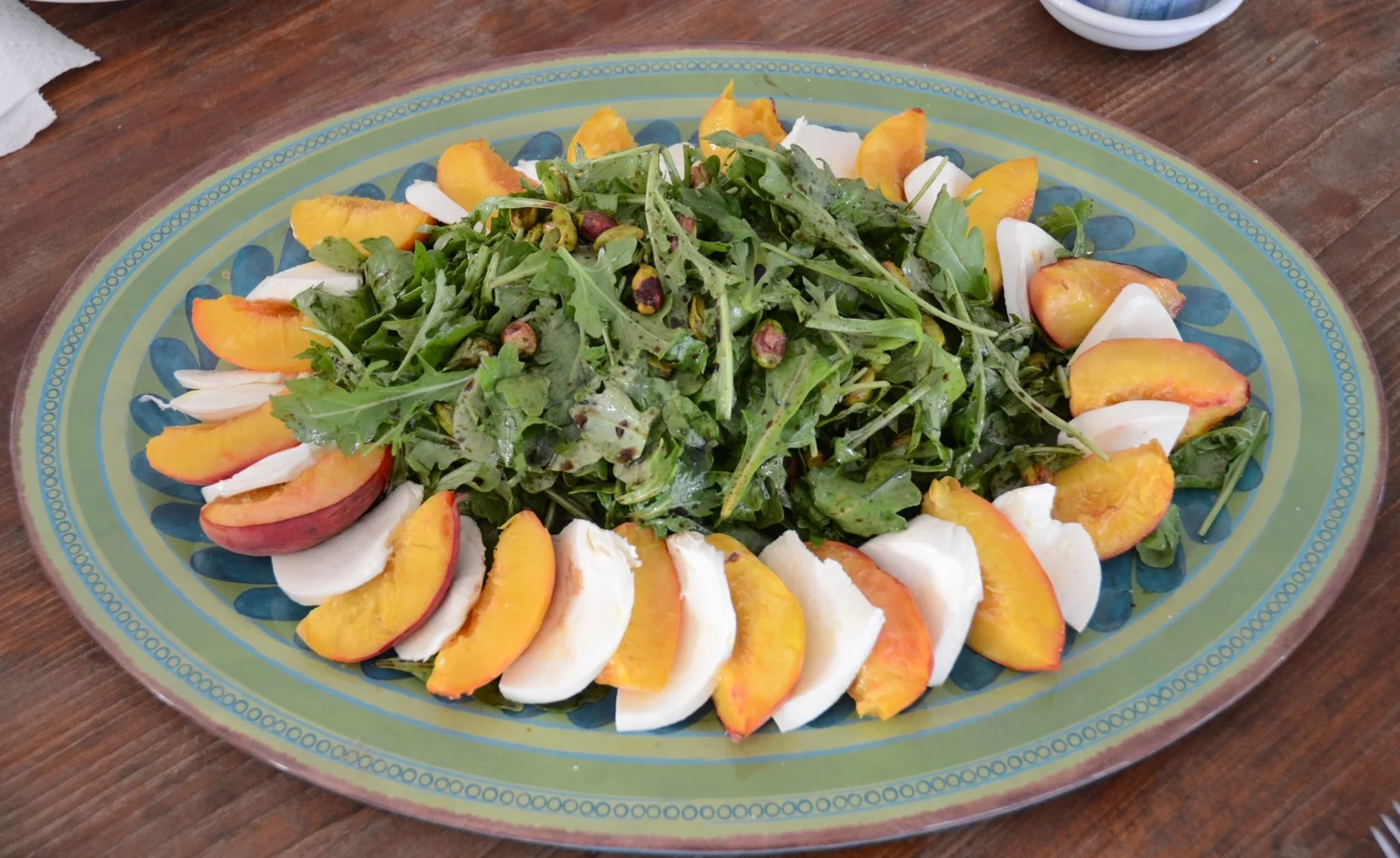 Arugula Salad with Roasted Peaches, Pistachios and Mozzarella