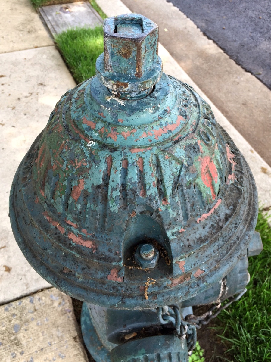 I love this ancient hydrant and its many layers of paint and patina.