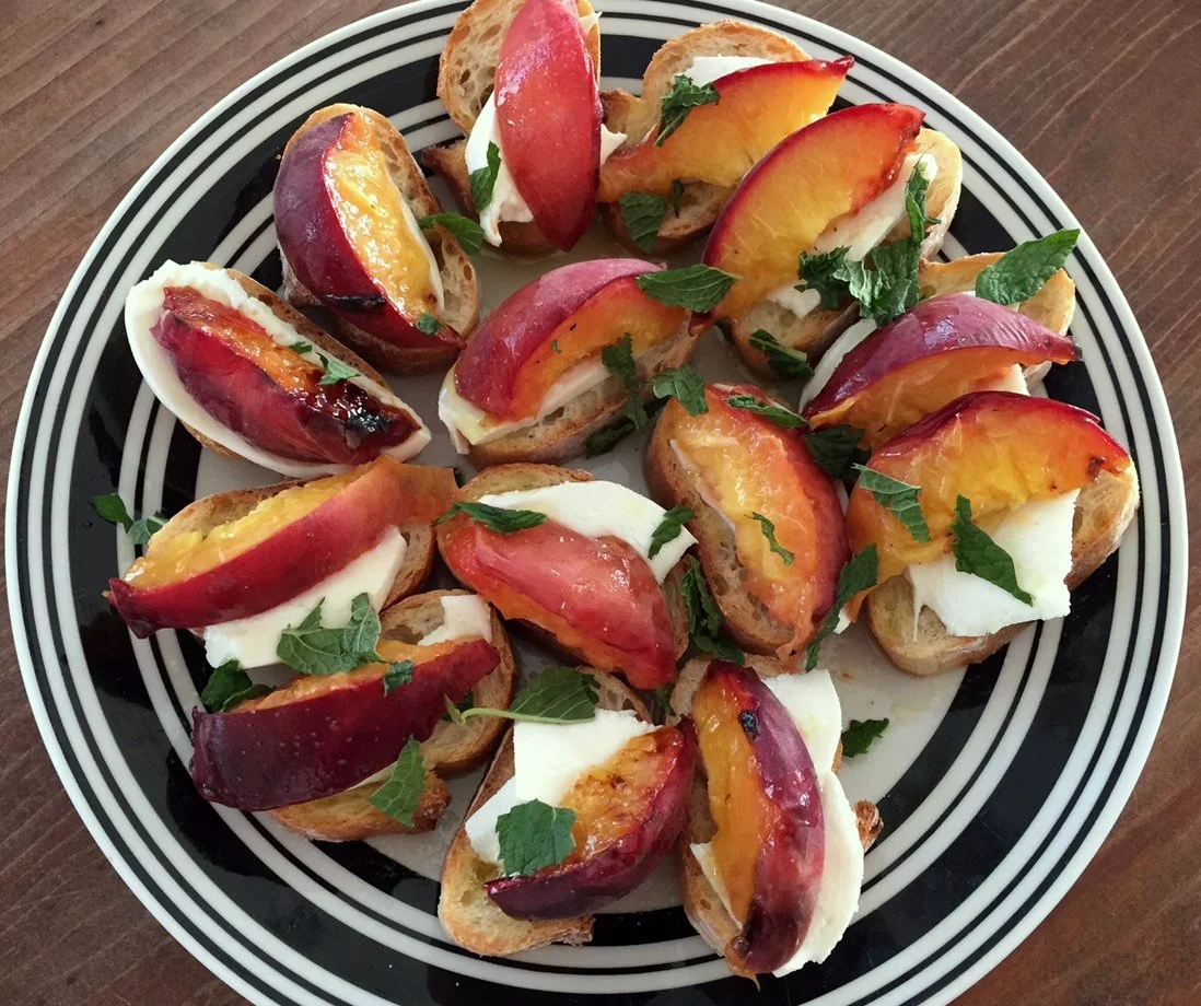 grilled peaches with mozzarella, toasted baguette, mint, olive oil and salt