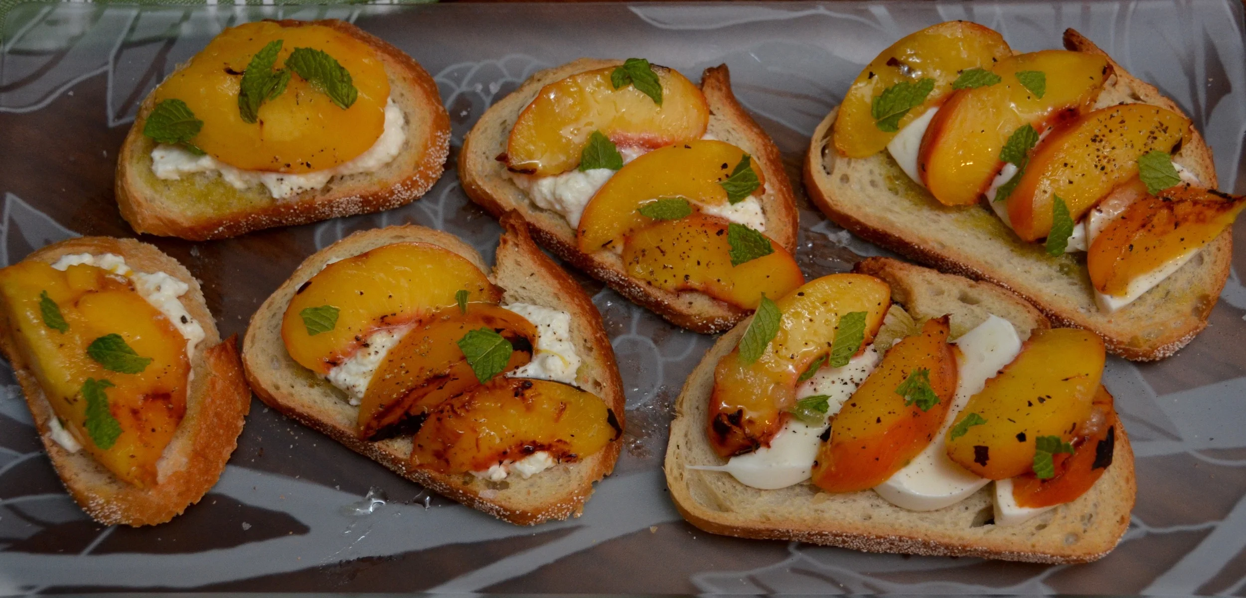 grilled peaches with mint, olive oil, grilled bread and either homemade ricotta (left) or mozzarella (right)