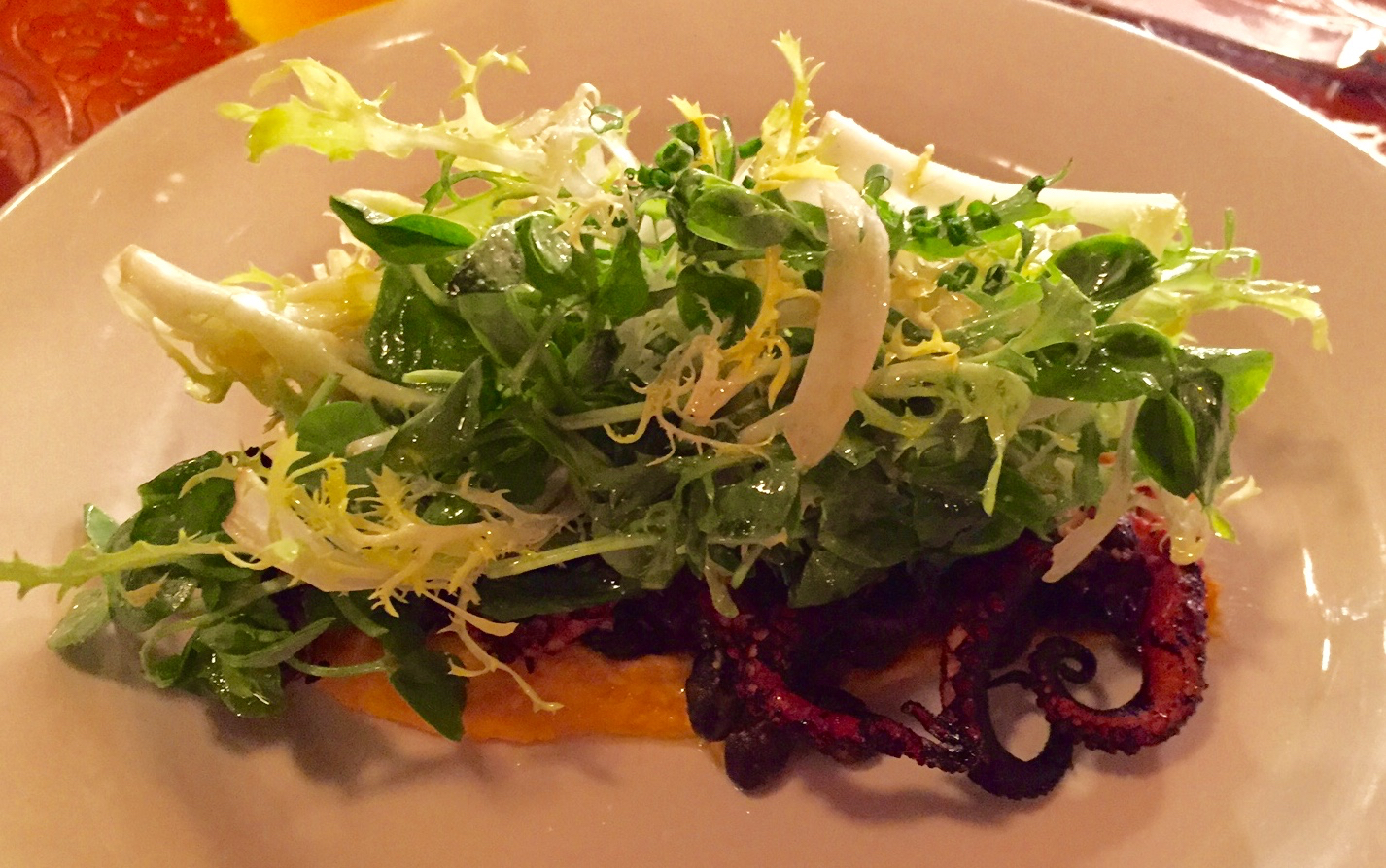 charred octopus with sweet potato hummus and frisee