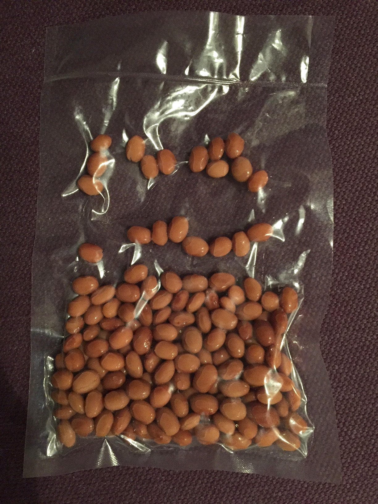 Jack and I are enormous fans of borlotti beans and so ordered a side in olive oil tonight. He loved them so much that he asked for another order to go. Checcino doesn't have take-away dishes and so prepared this adorable sealed bag o' borlotti for J. He was thrilled.