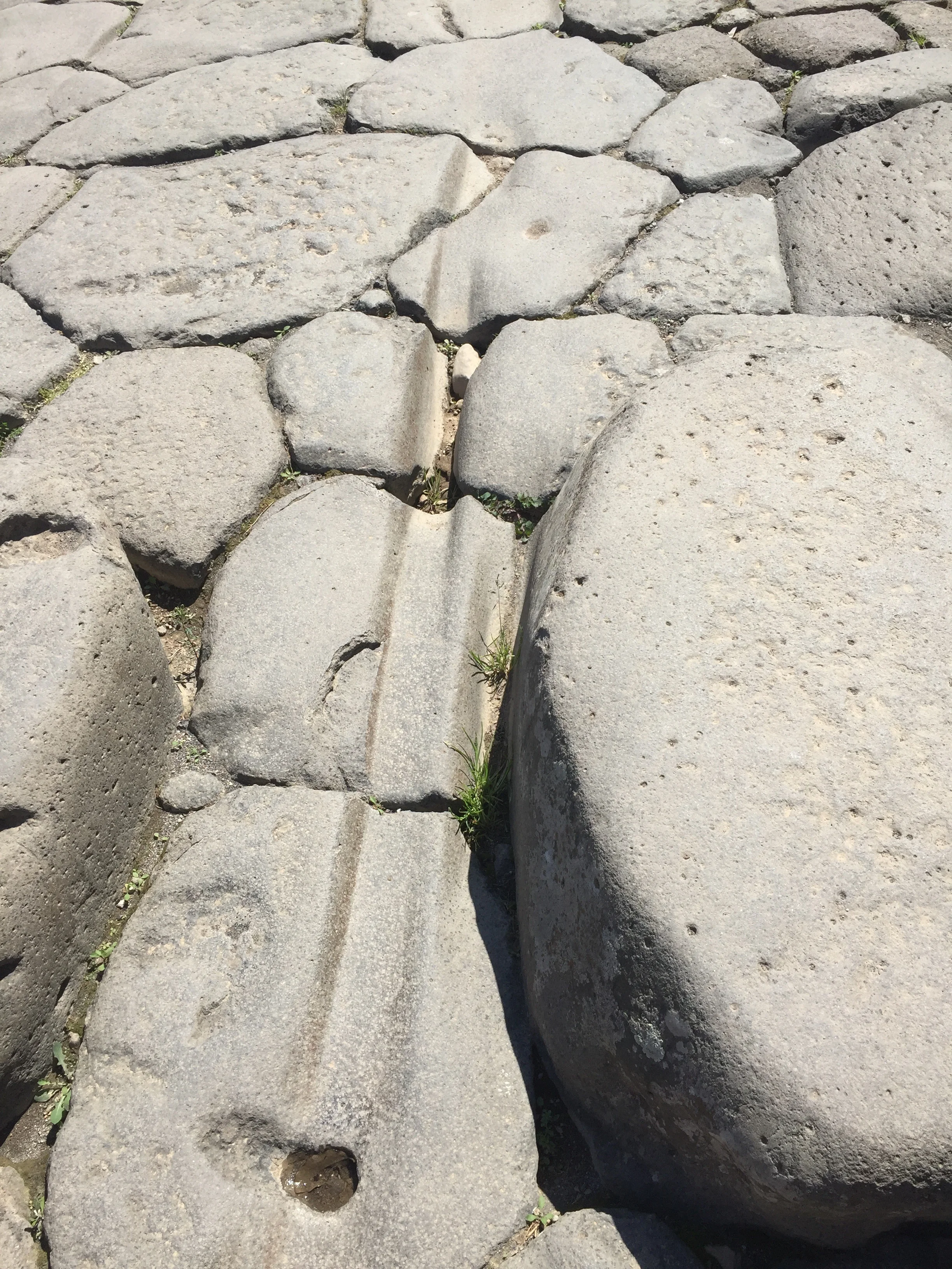 Ruts worn in the paving stones by carts over the years