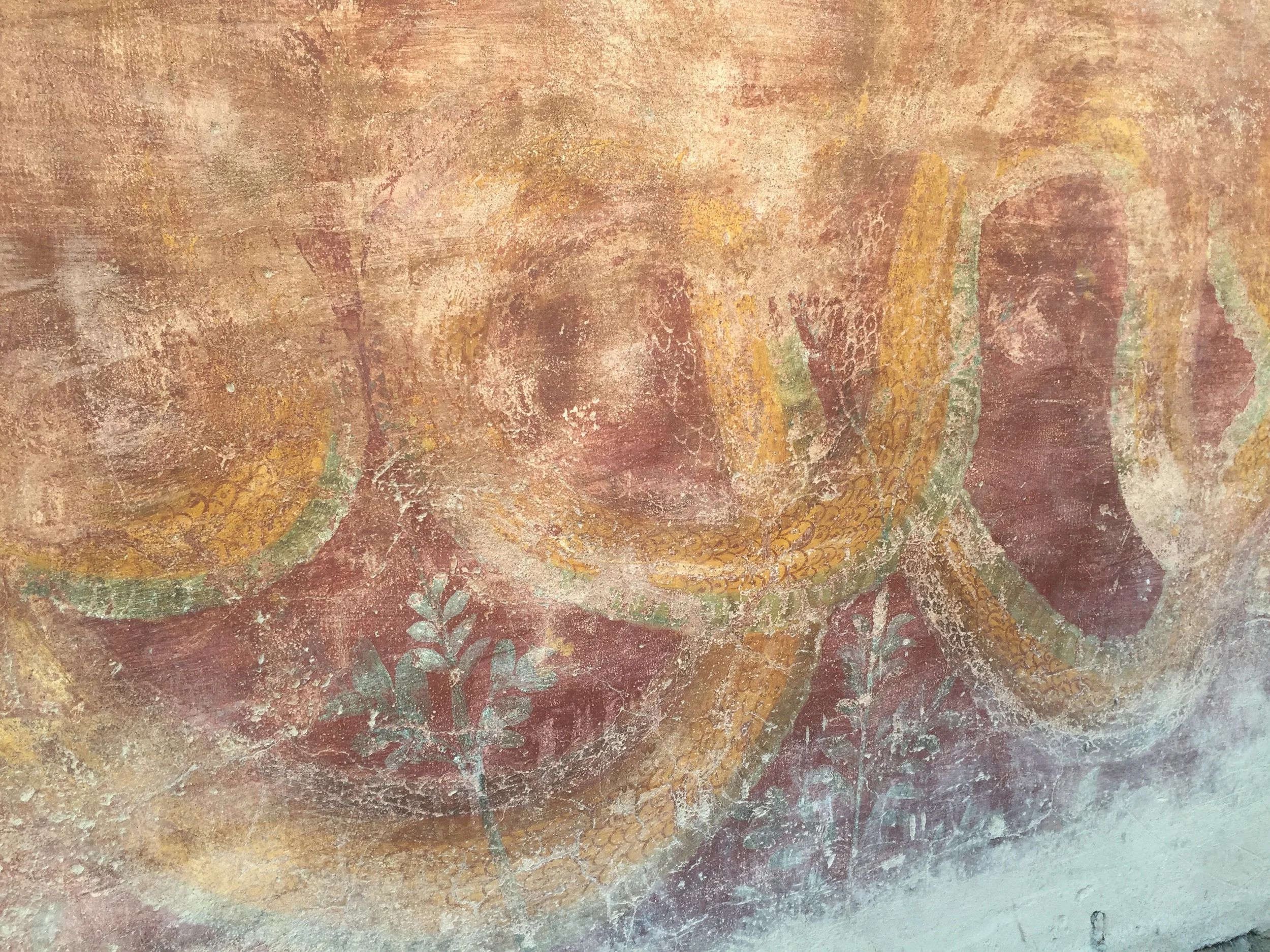 A snake fresco before the brothel; you should see the menu of options folks had!
