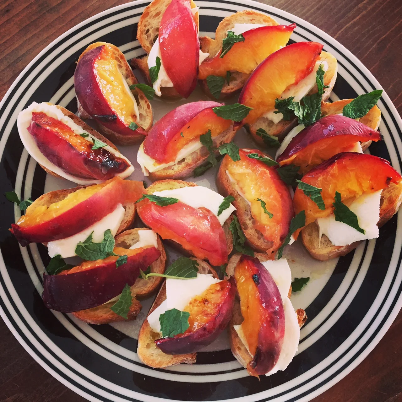 grilled peaches with burrata and mint
