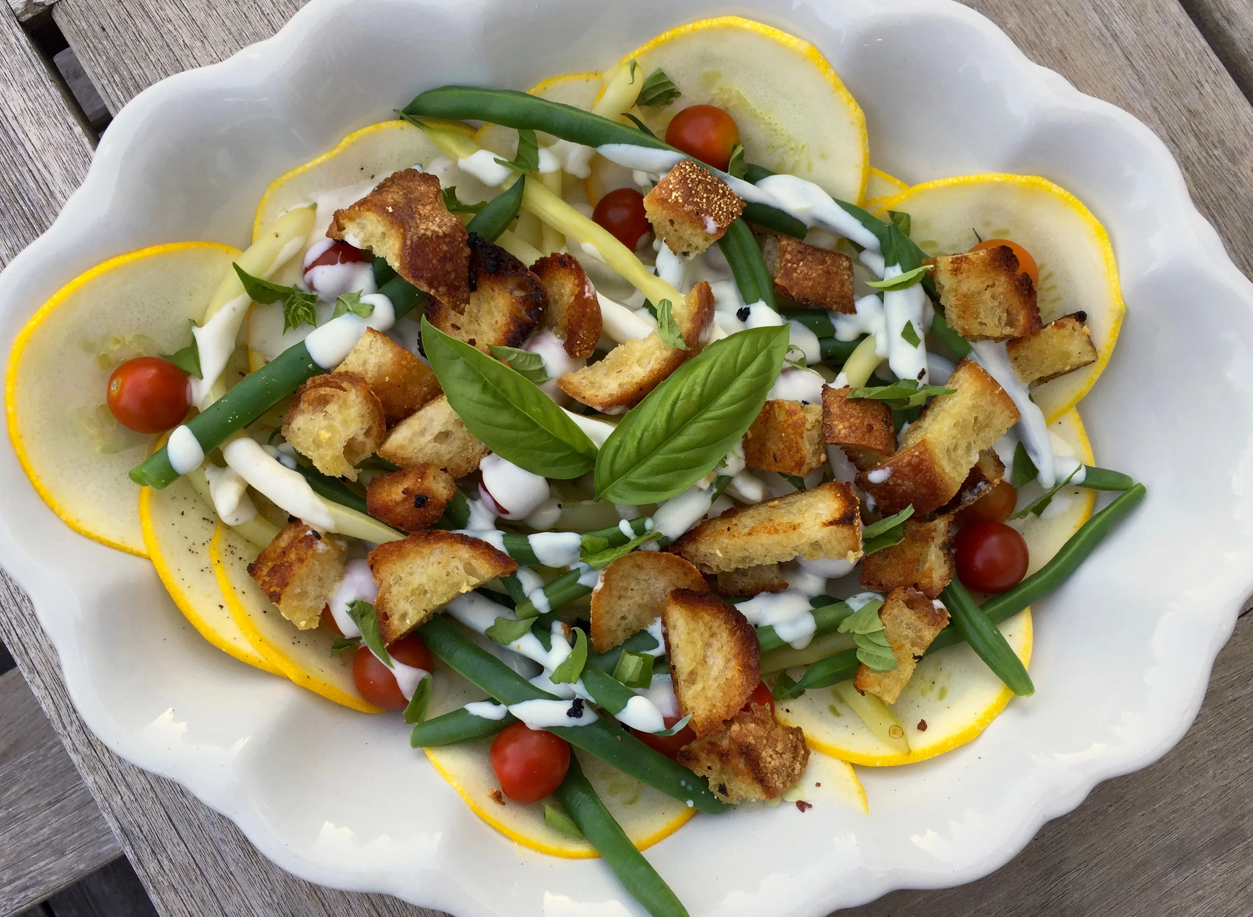 shaved eight ball squash with steamed beans, tomatoes, basil, croutons and buttermilk-creme fraiche dressing