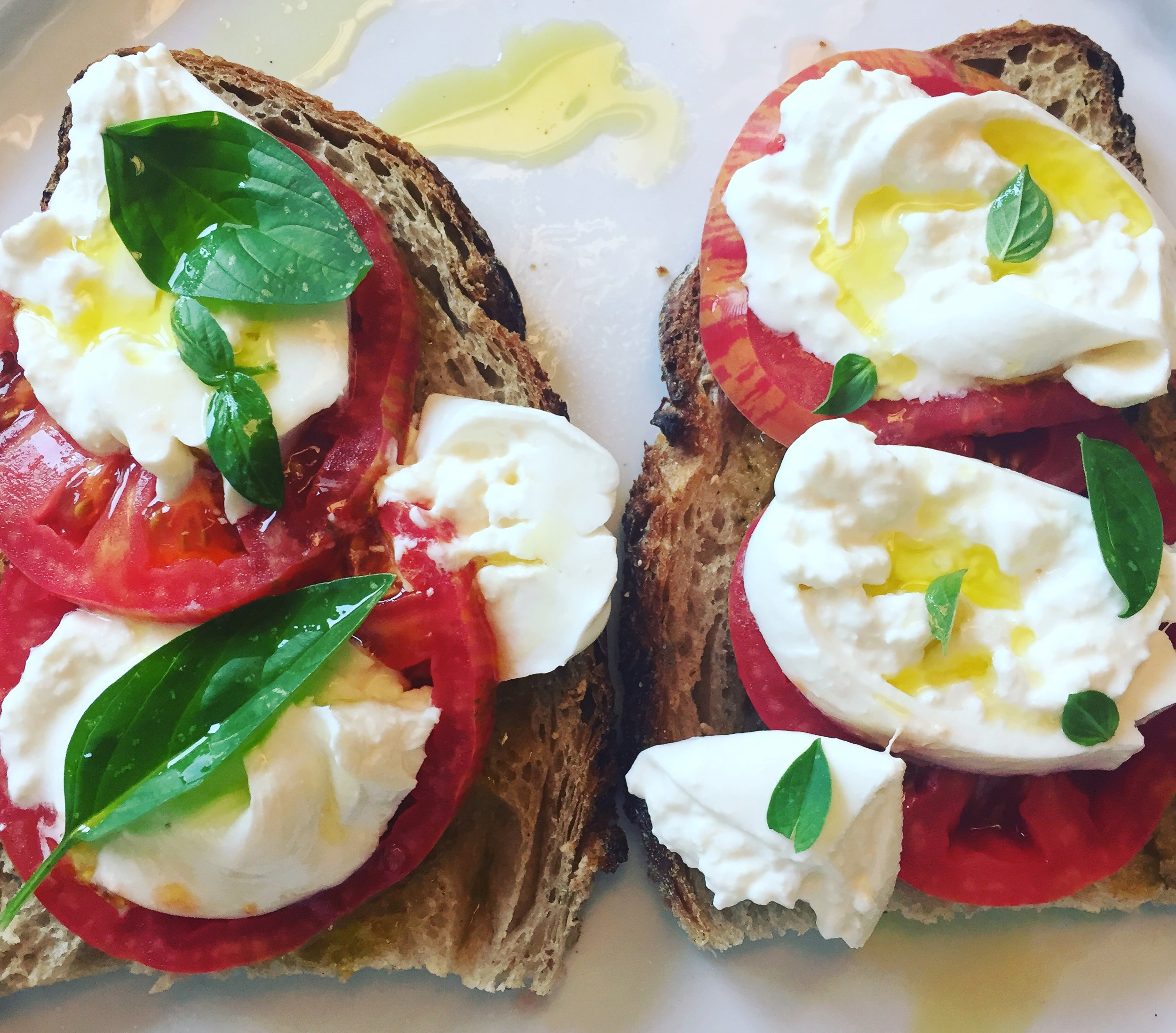 pain de campagne, burrata, tomatoes, basil, and great olive oil