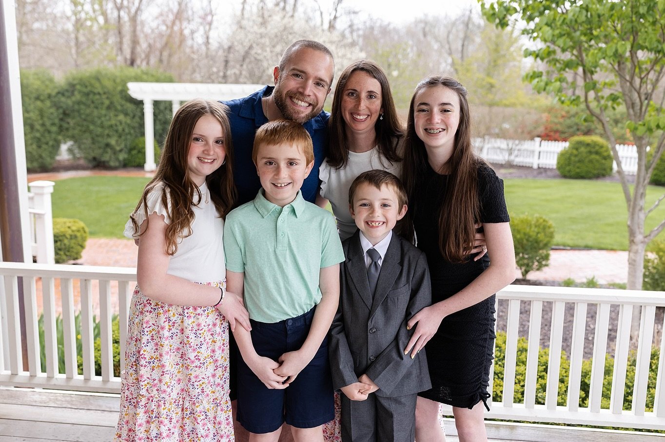 This family is most likely cursed by the photo weather gods, but they always make it look otherwise! Not many folks would smile this big in the pouring rain 😜