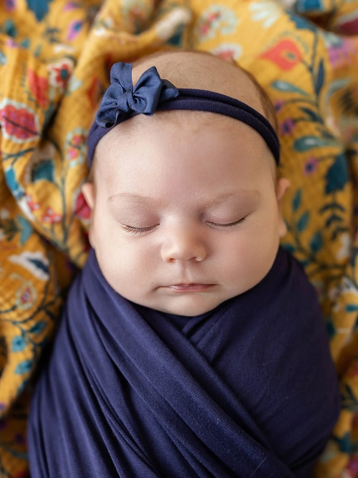 Baby Elliott arrived to her newborn session just a week after her maternal grandma unexpectedly passed away. When Elliott&rsquo;s mom asked if I could incorporate these signature yellow pants that her mom always wore, it was an easy yes.  I love the 