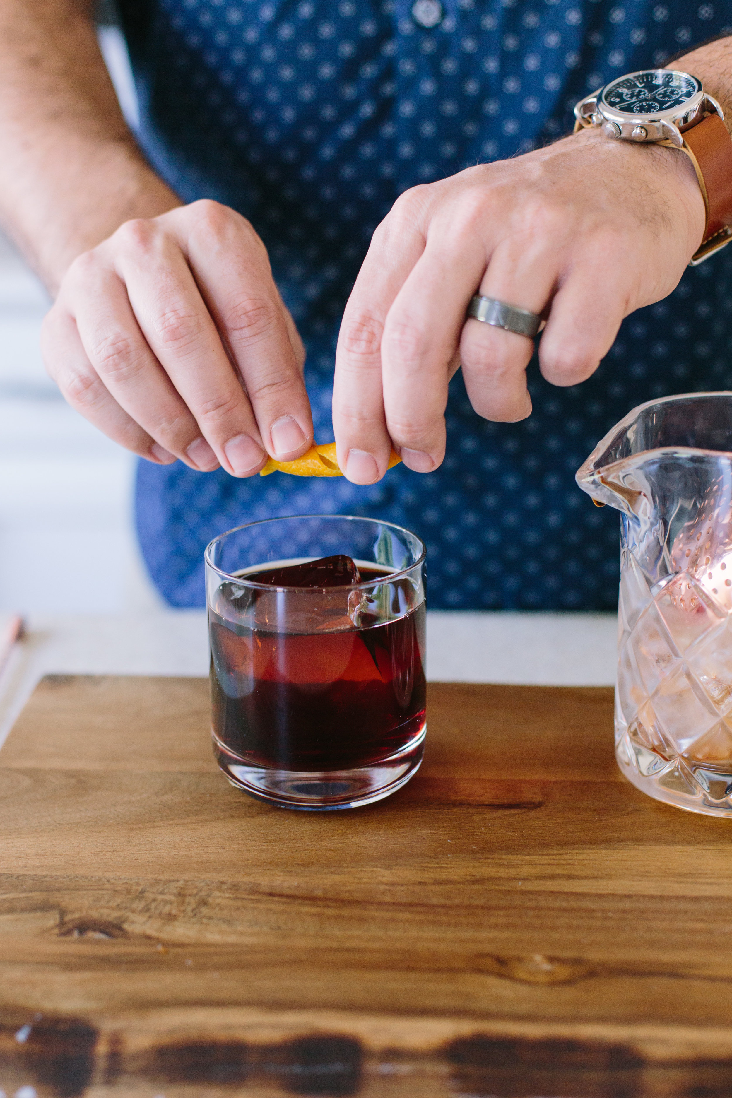 Express orange peel and then rub around the rim of the glass for that tasty aroma. 