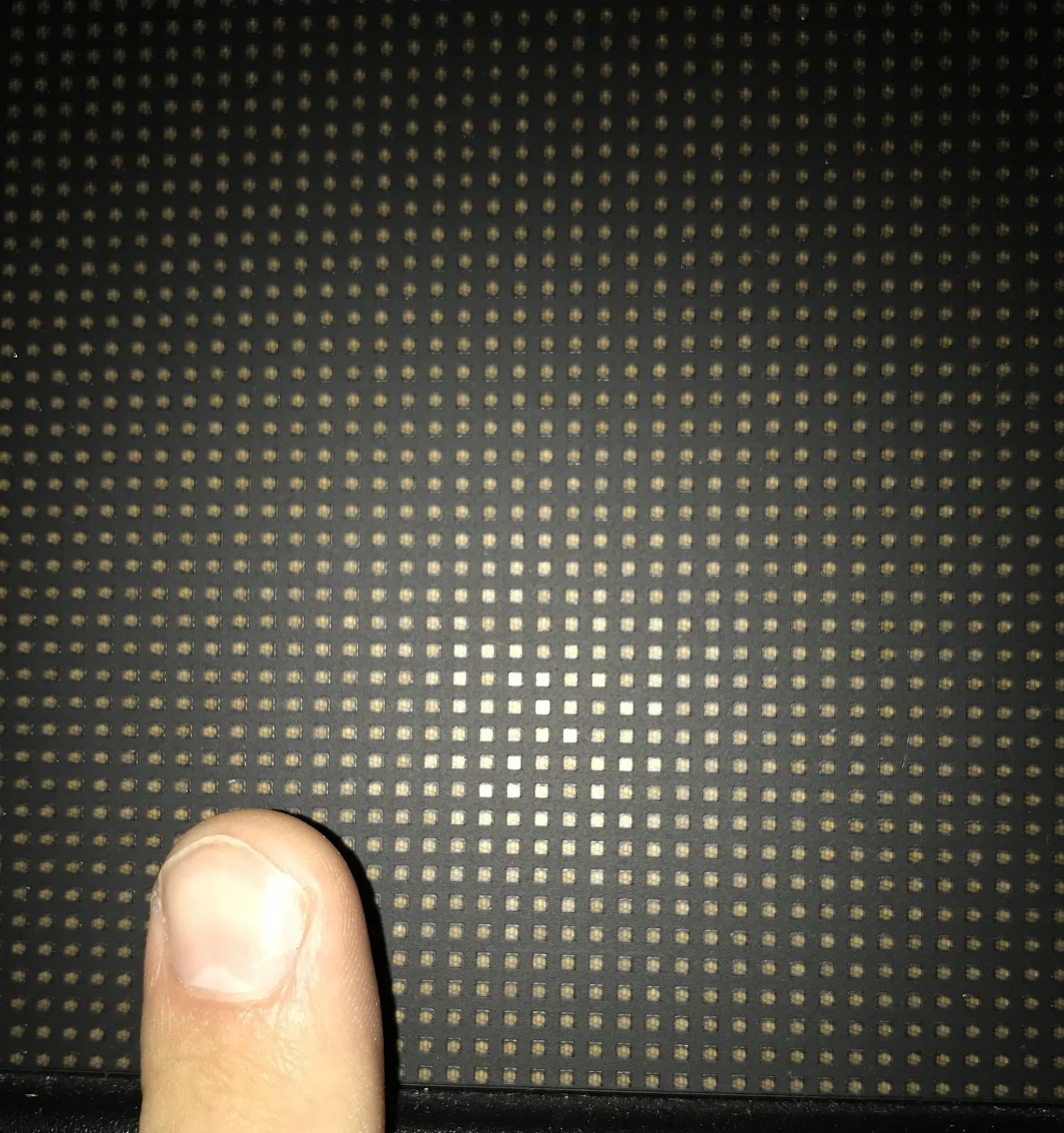 My index finger held up against the screen. If you look closely you can see the 4 LED lights inside each "pixel".