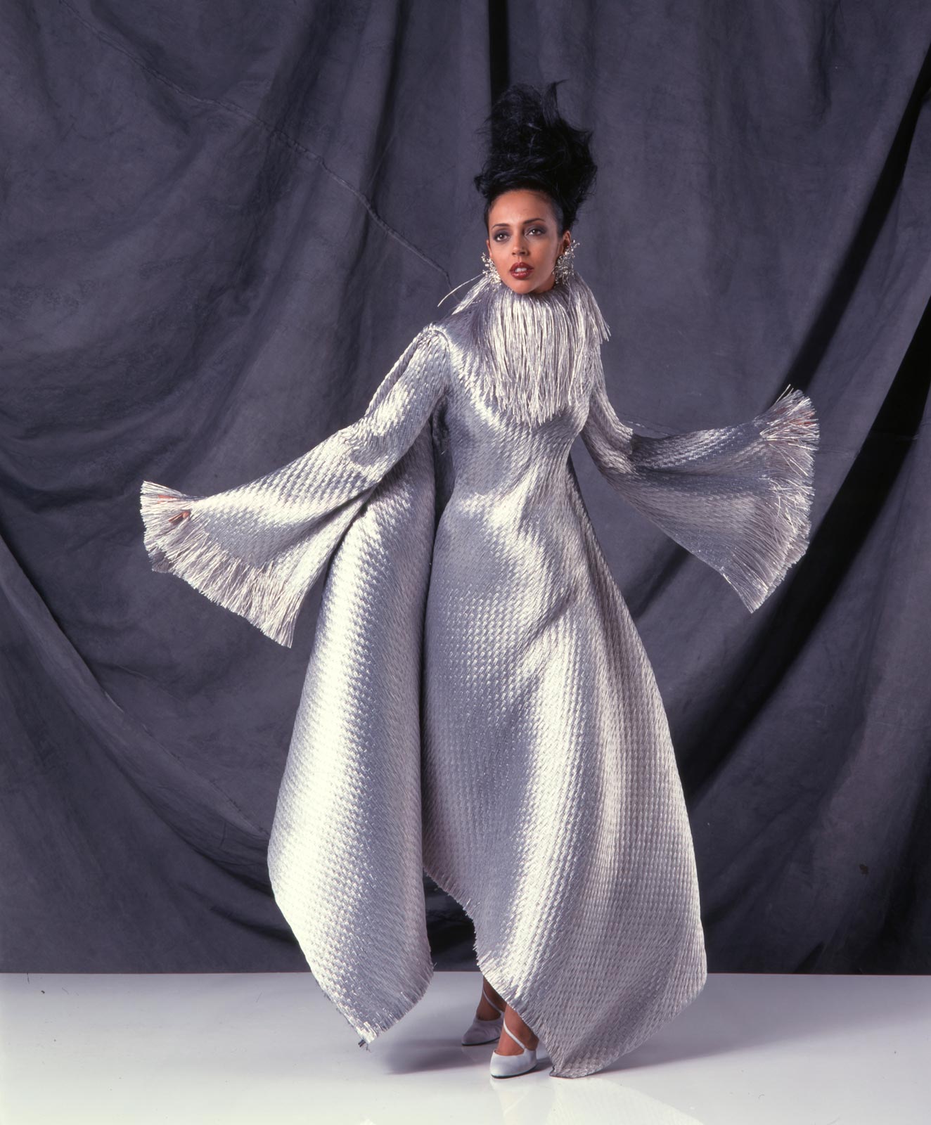 GIVENCHY by Alexander McQueen (France). Evening dress of synthetic raffia mounted on silk gauze: appeared in The Jazz Age of Fashions, Fall/Winter 1997-1998.