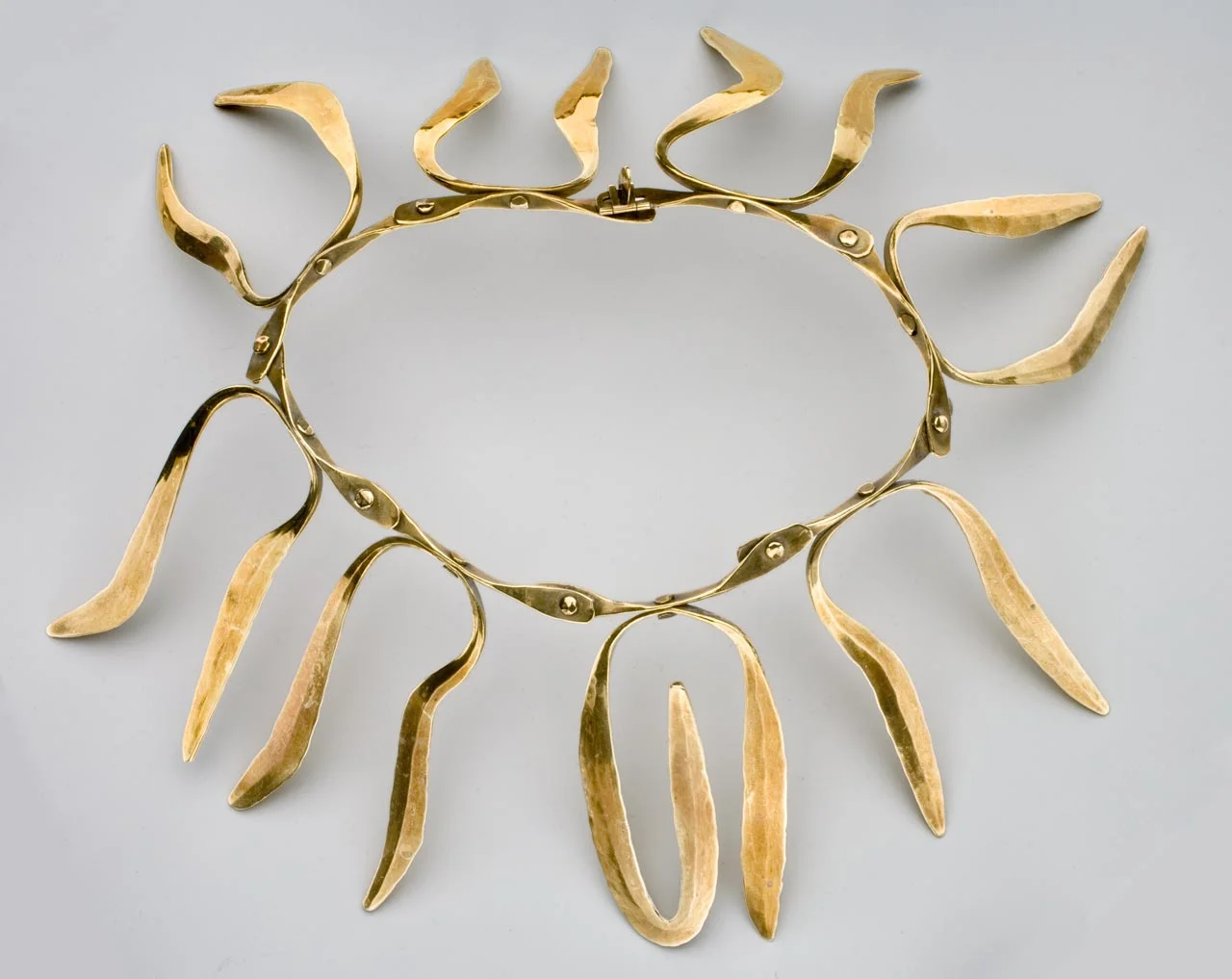 BRASS NECKLACE BY HARRY BERTOIA.