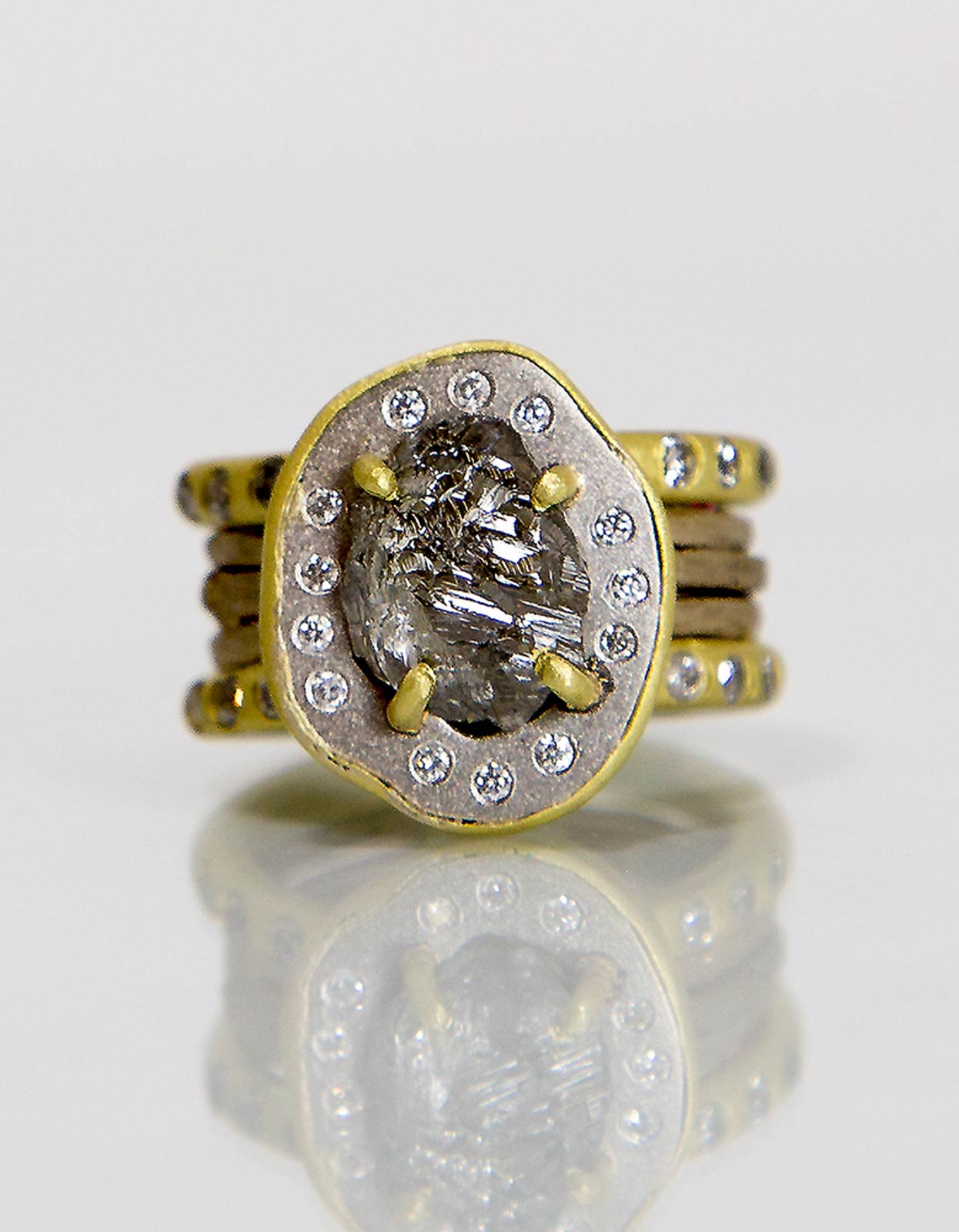 NATURAL GRAY DIAMOND RING of platinum, eighteen karat gold, diamonds, rough diamond, 2014. Photograph by Shannon Partrick.
