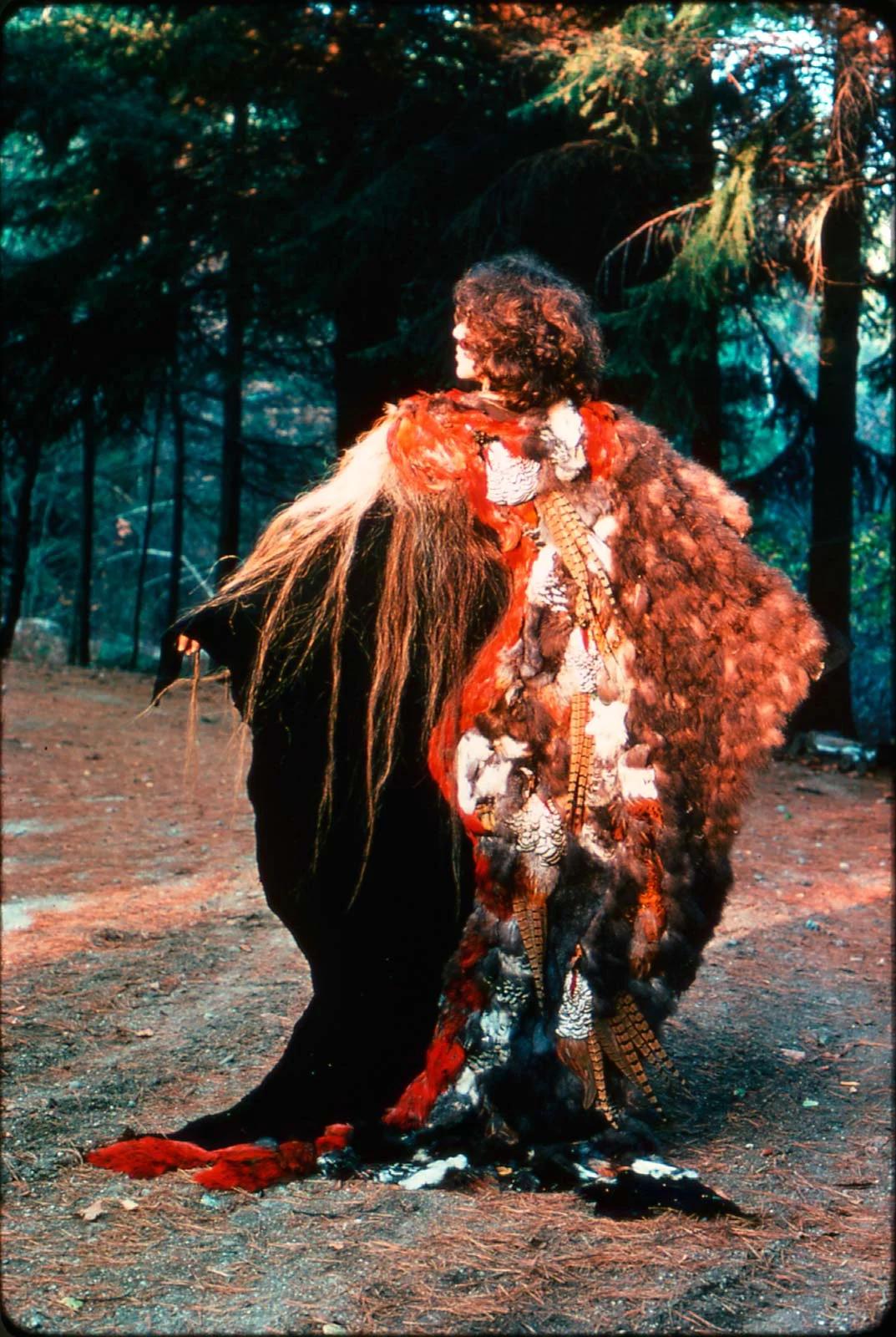 CAPE, SHAMAN’S ROBE of feathers, horsehair and leather, worn by Nicki Marx, and exhibited in “California Design ‘76,” 1975. Photographer unknown.