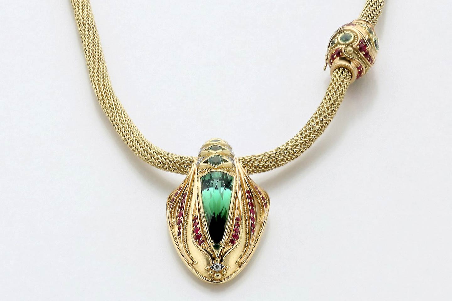 KENT RAIBLE. From The Deep Necklace of eighteen karat yellow and twenty karat pink gold, platinum, indicolite tourmaline, tsavorite, garnets, rubies, and diamonds, First Place: Gold/Platinum.