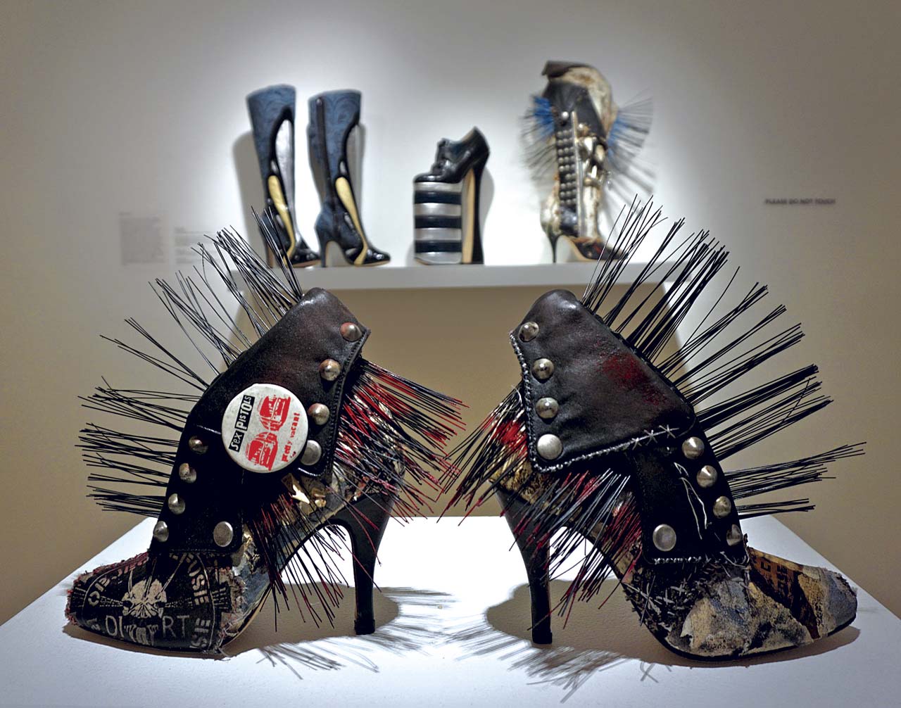 PUMPS of artist’s pants, broom bristles, Sex Pistols button, found fabric, dental floss, roofing tar, 2014. The broom bristles used for this piece come from Francis’s shop. Photograph by Chris Francis.