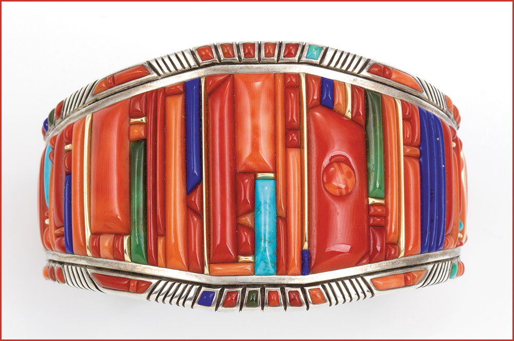 BRACELET by Raymond C. Yazzie of silver, coral, turquoise, lapis lazuli, fourteen karat gold, 6.03 x 2.54 centimeters, 2005. Collection of Mark and Martha Alexander. Photograph by Michael S. Waddell. Photographs courtesy of the National Museum of the American Indian.