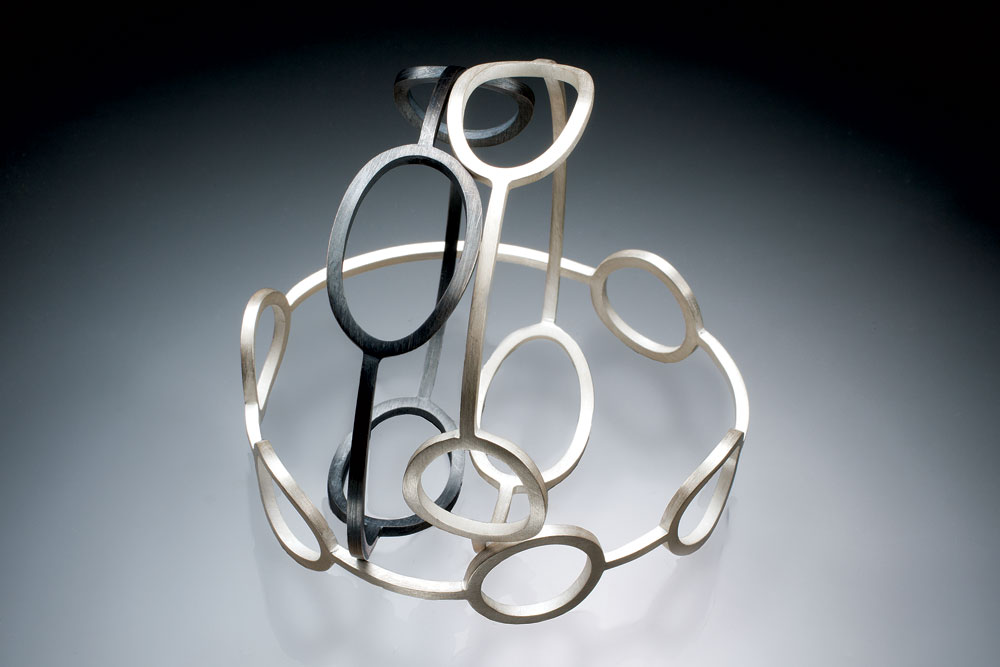 SQUARE STOCK BRACELETS WITH OVALS AND CIRCLES of sterling silver, 5.08 x 7.62 x 2.54 centimeters, 2013.