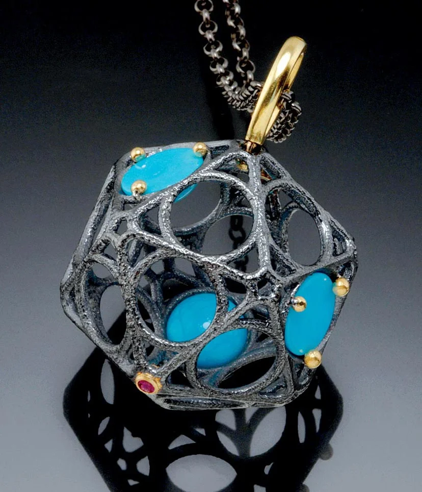 MARCO LEE COLLECTION ICOSAHEDRON PENDANT of oxidized sterling silver and eighteen karat yellow gold set with sleeping beauty turquoise and rubies, CAD designed and 3-D printed, 2.39 x 2.79 centimeters, 2012.