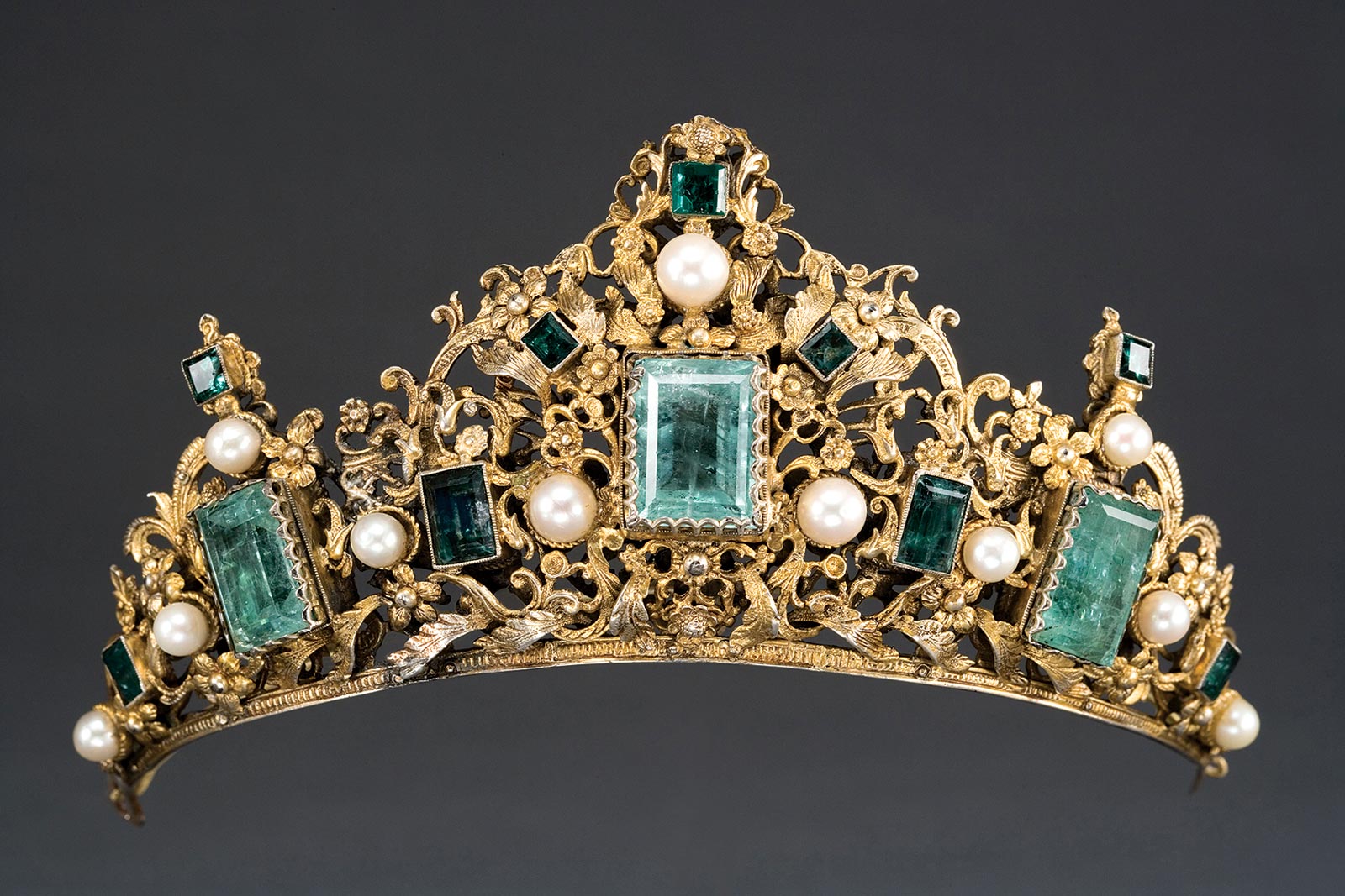 TIARA of gilt silver, emeralds, pearls, Colombia or Ecuador, circa 1690. 