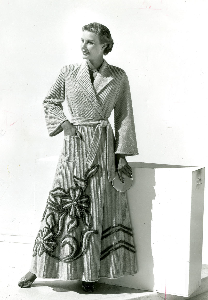 MODEL wearing a chenille robe by Art-Rich, circa 1953. Courtesy of Bandy Heritage Center for Northwest Georgia, Carpet and Rug Institute Photograph Collection.