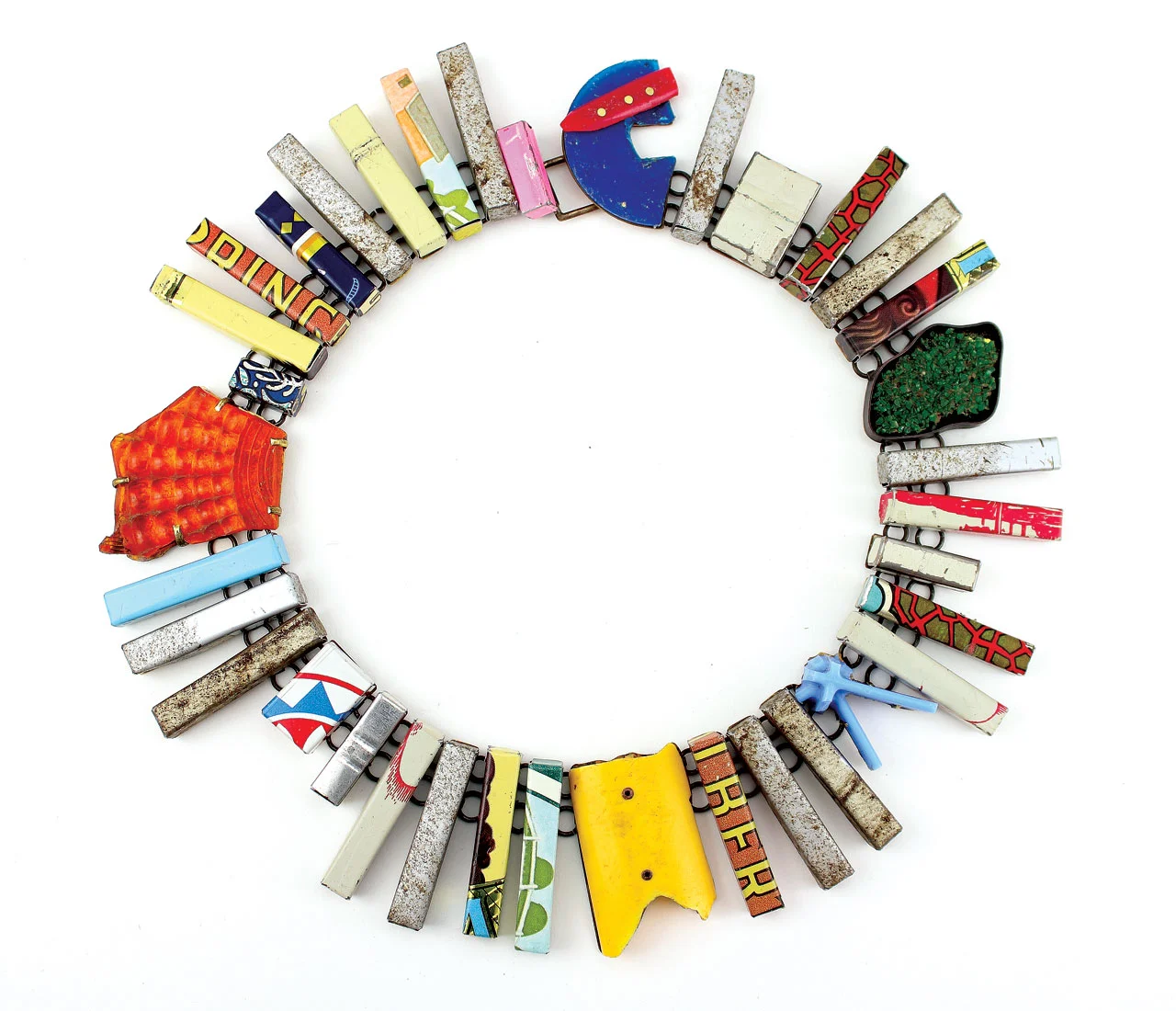 TRACTOR TRAILERS AND TRASH NECKLACE of tin, found objects, sterling silver, brass, steel, 116.0 x 116.0 x 3.3 centimeters, 2012.