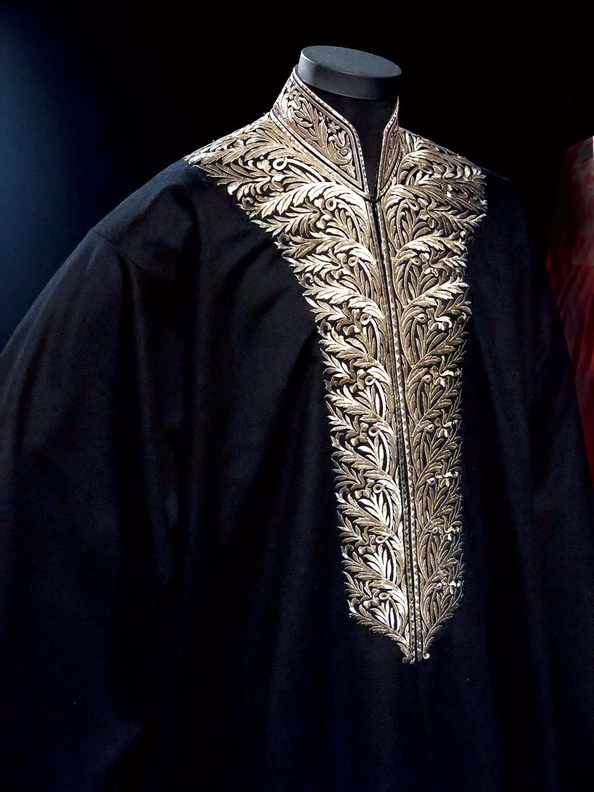 DETAIL FROM COAT OF RABBI SALIMAN MENACHEM MANI of broadcloth and gilt-metal-thread couched embroidery, Hebron, Ottoman Palestine, early twentieth century. Photograph by Patrick R. Benesh-Liu/Ornament.
