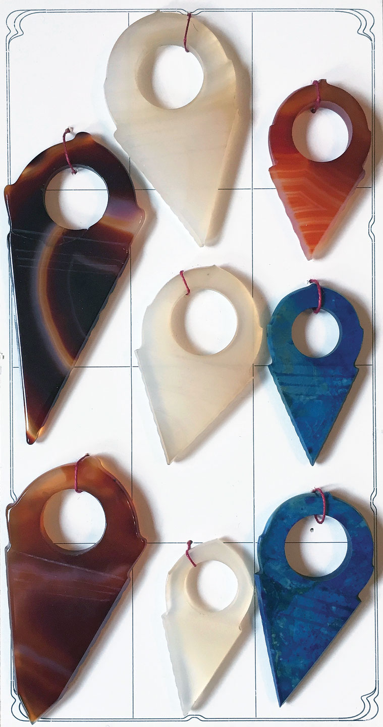 BEAD SAMPLE CARD FROM THE GEBRÜDER WILD COMPANY, of hand-polished talhakimt, with sharp edges, thus pre-1960s. The blue agate examples have not been seen in the African trade.