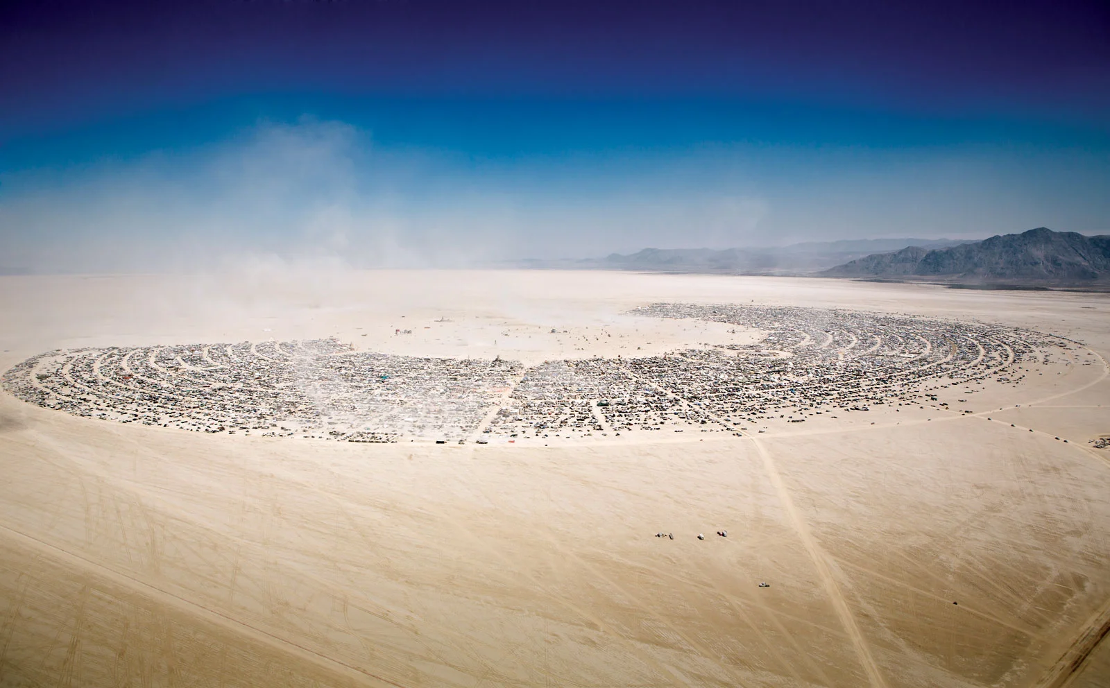 AERIAL VIEW of Burning Man gathering at Black Rock City, 2012. Photograph by Scott London.